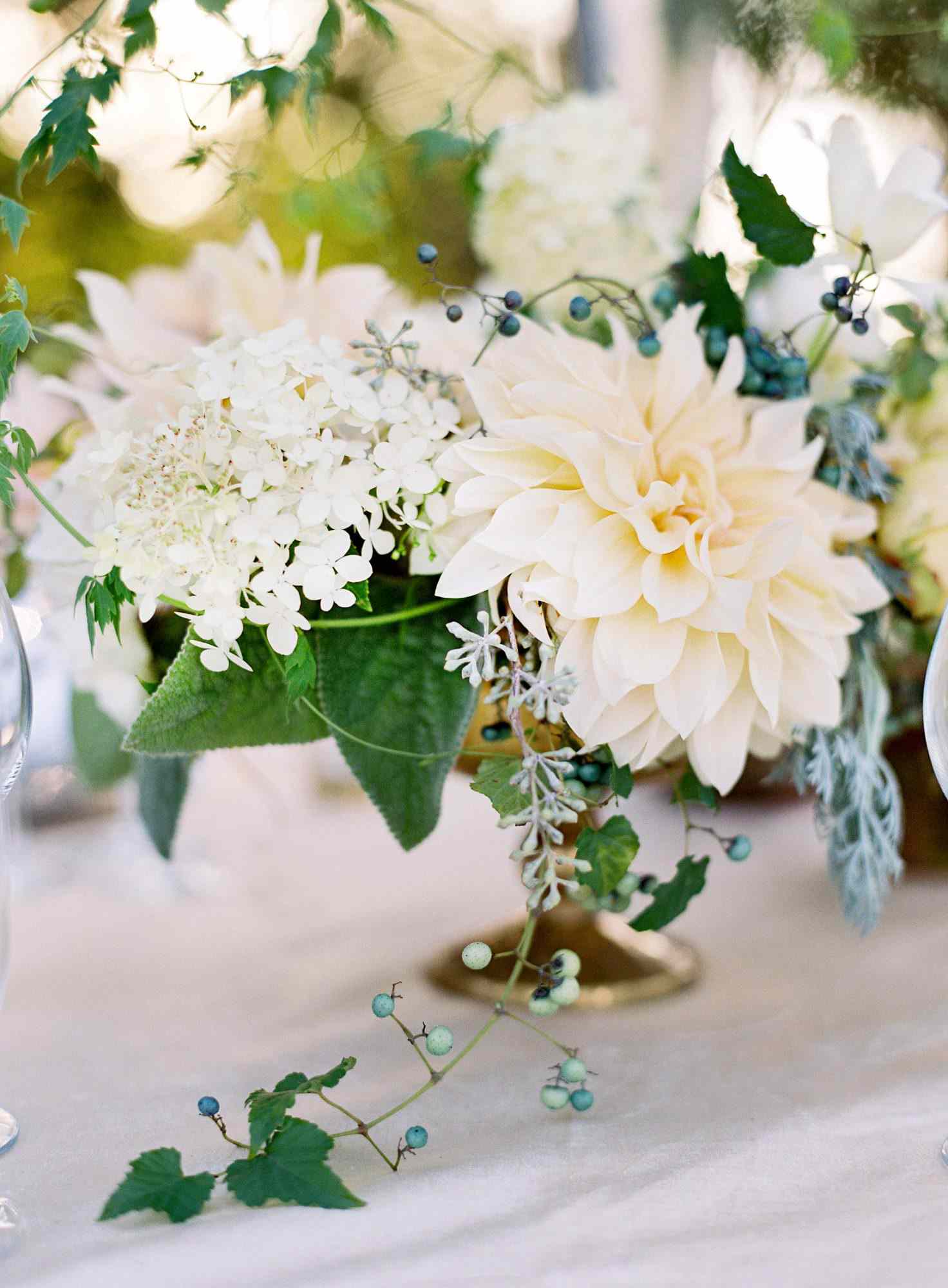 dahlia wedding centerpieces white flowers and greenery