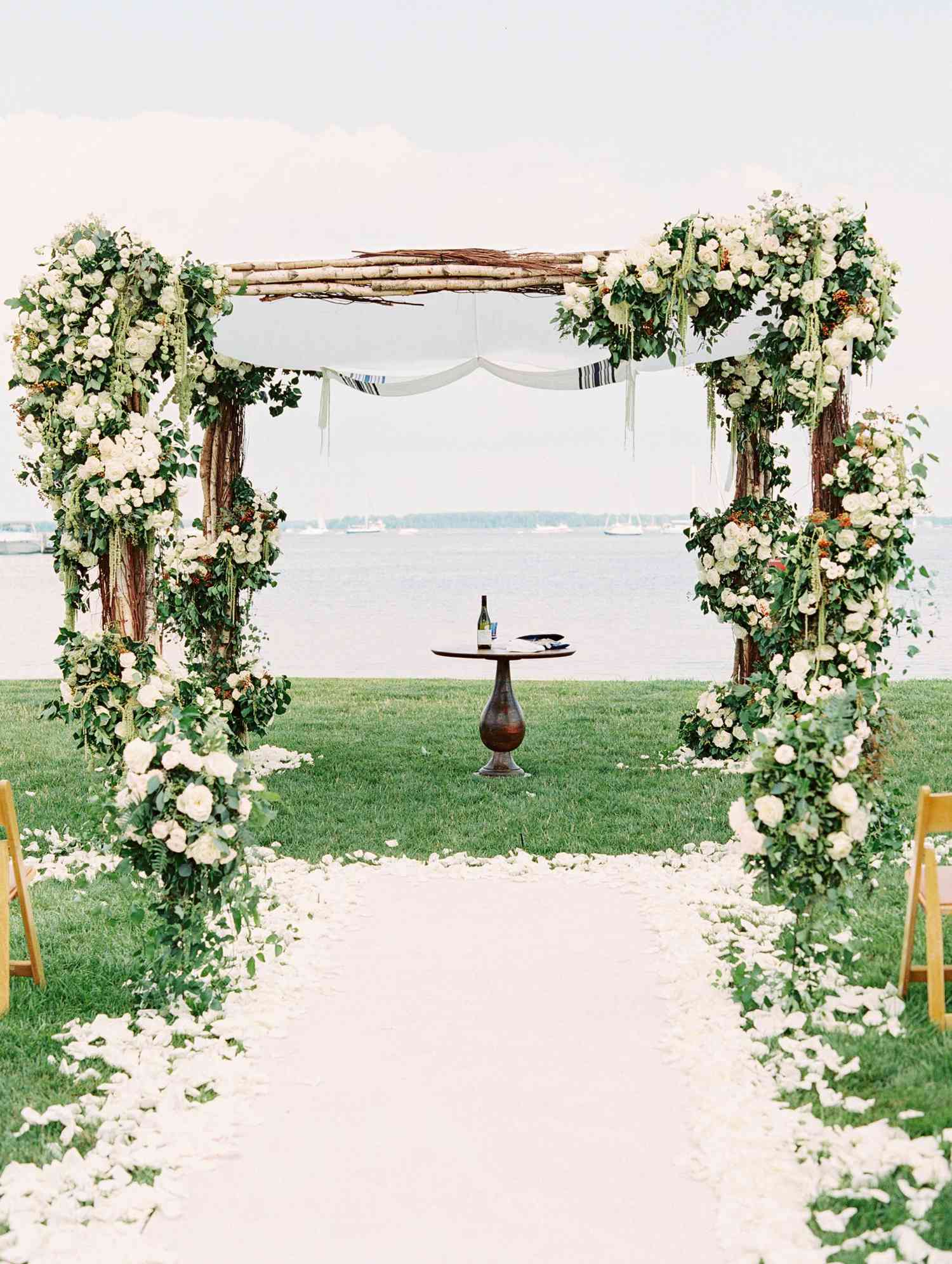 Unkempt Willow Branch Wedding Arch with Pink and Orange Flowers