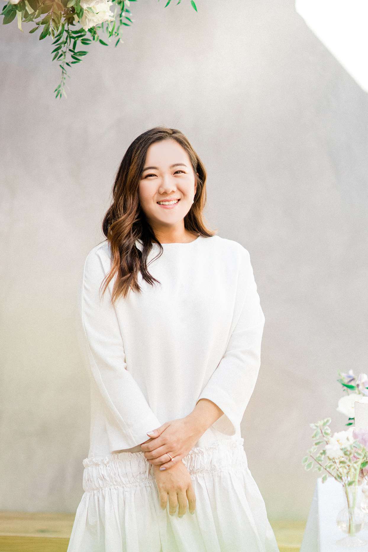 bride dressed in white for shower