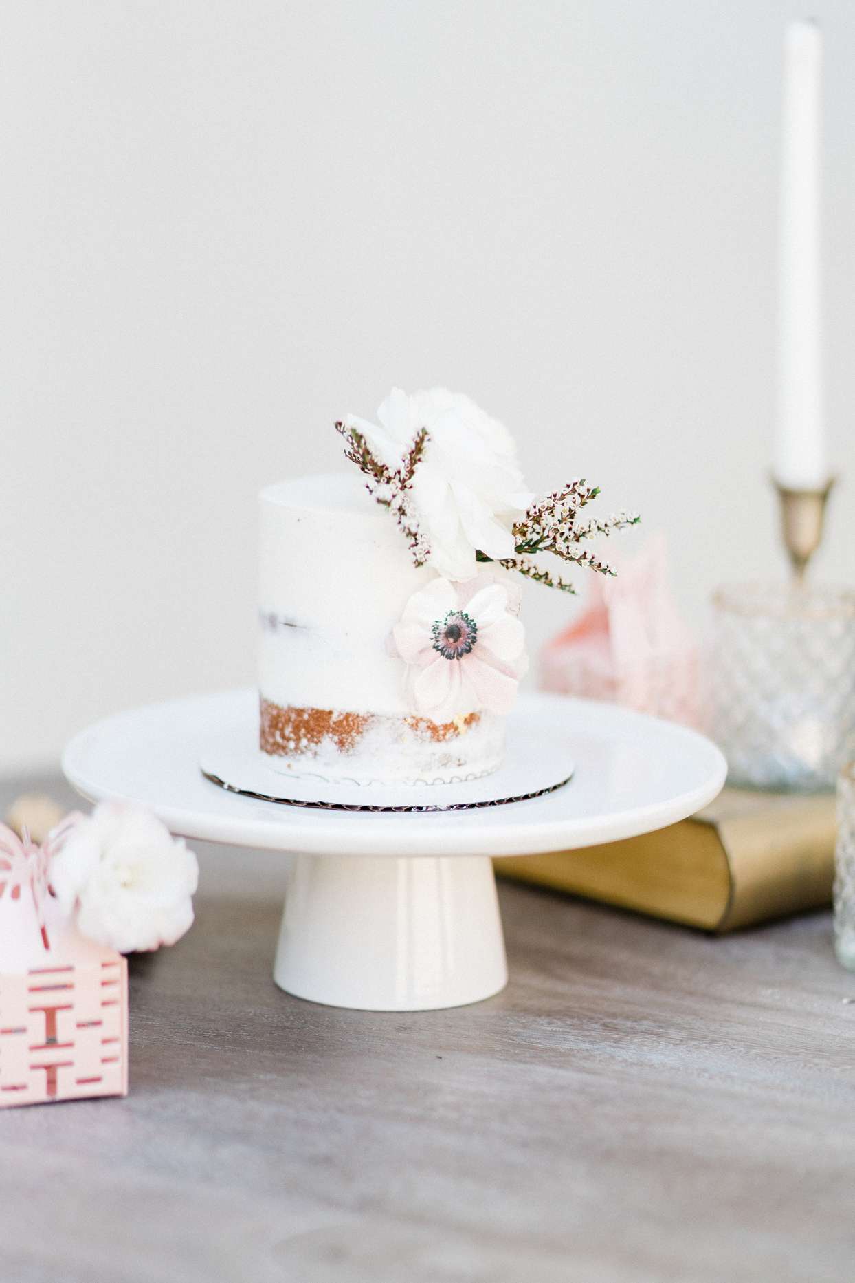 Two-tier white frosted cake