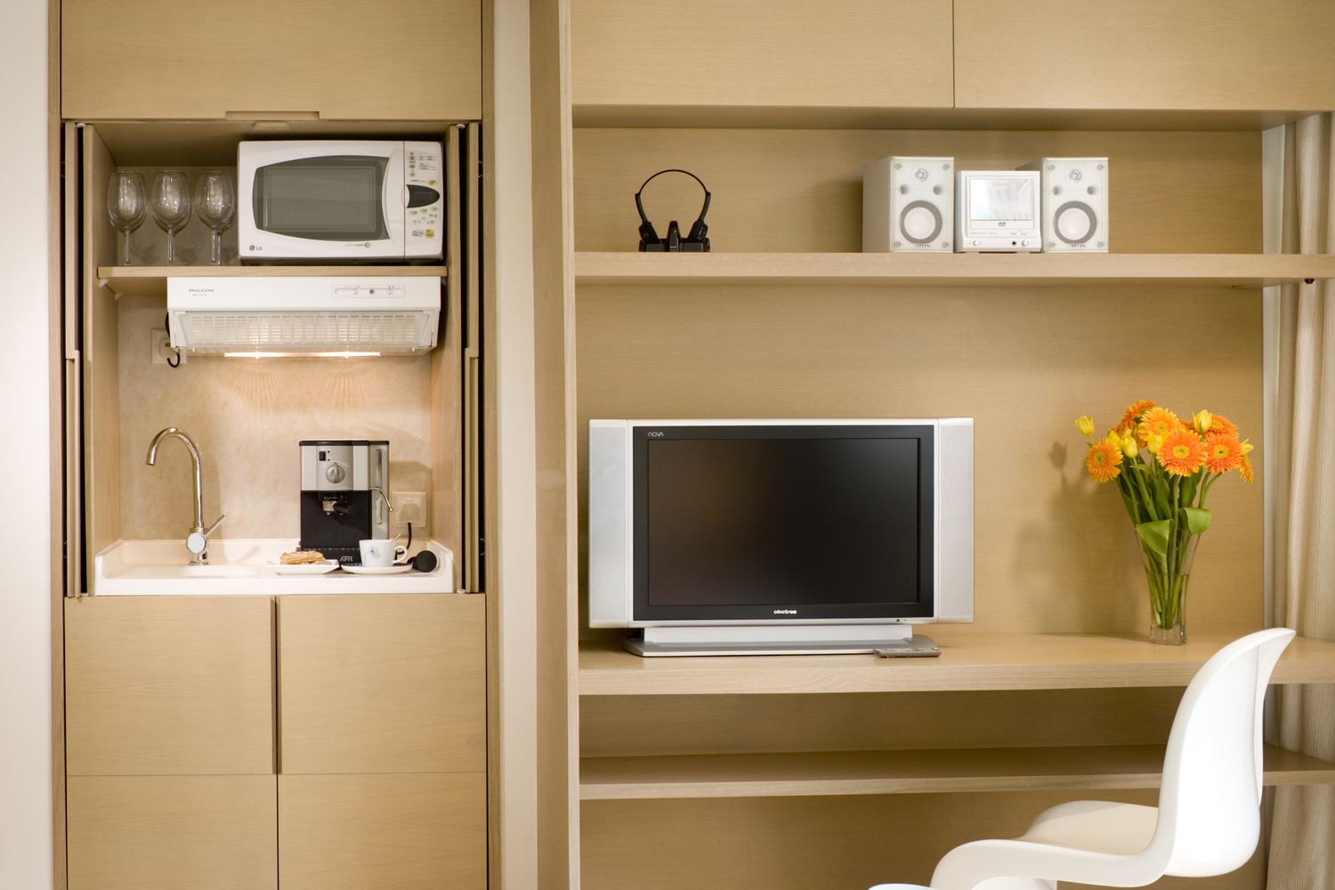 A coffee bar next to a TV