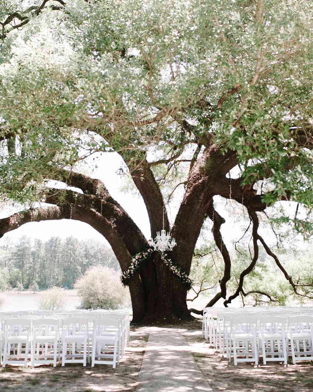 single chandelier wedding ceremony outdoor decor