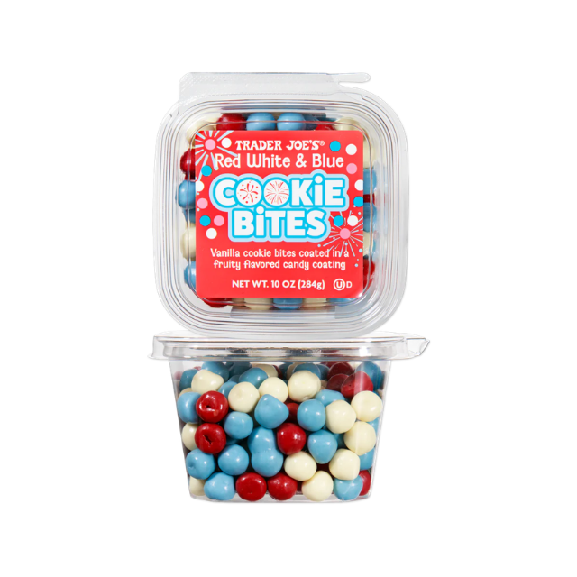 Trader Joes Red White Blue Cookie Bites in a clear plastic container with a labeled lid candies visible inside