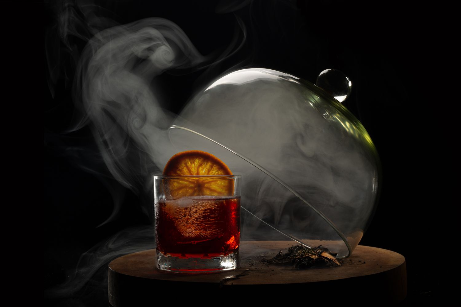 negroni cocktail under smoking glass cover
