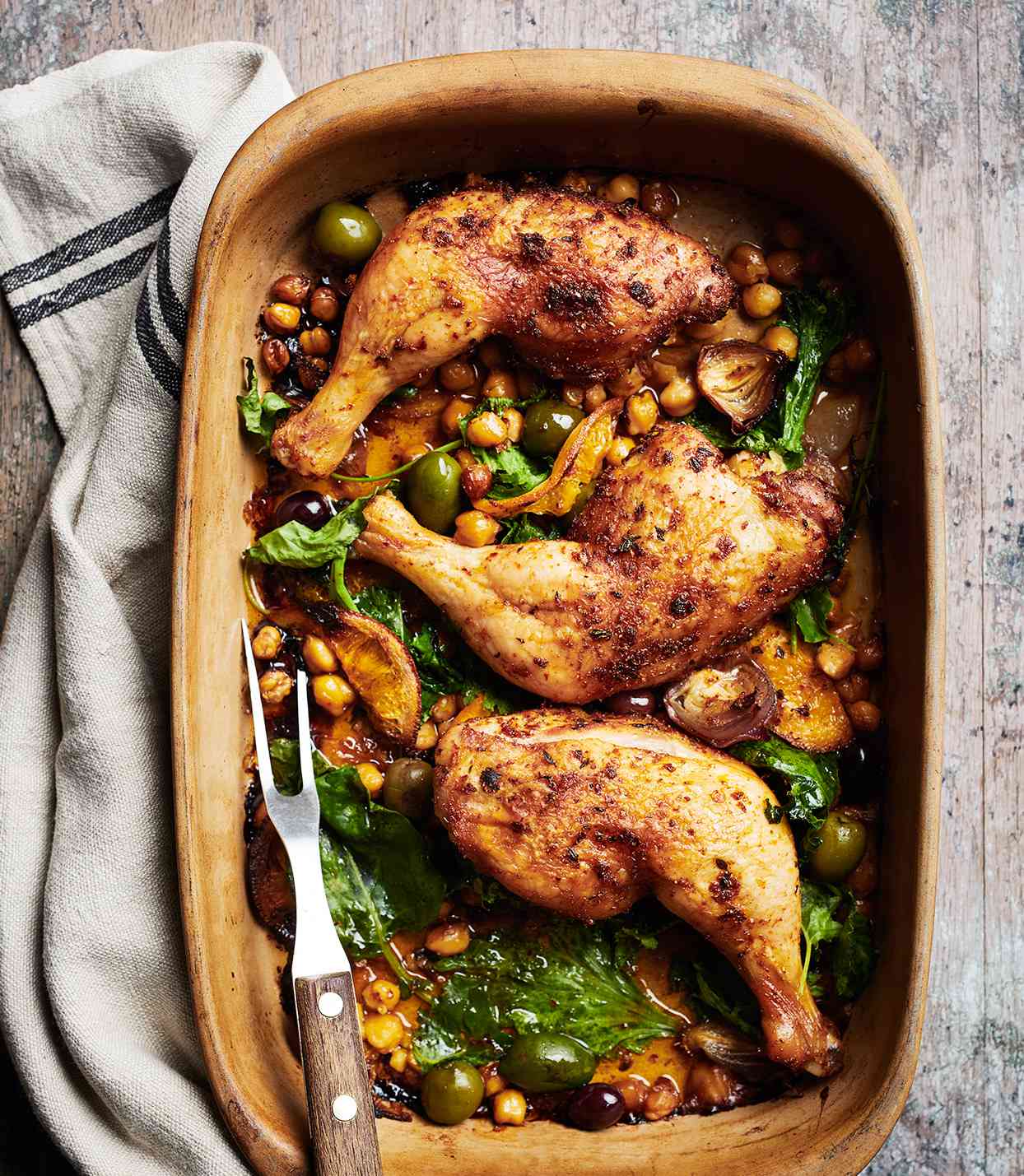 baked chicken legs with chickpeas olives and greens