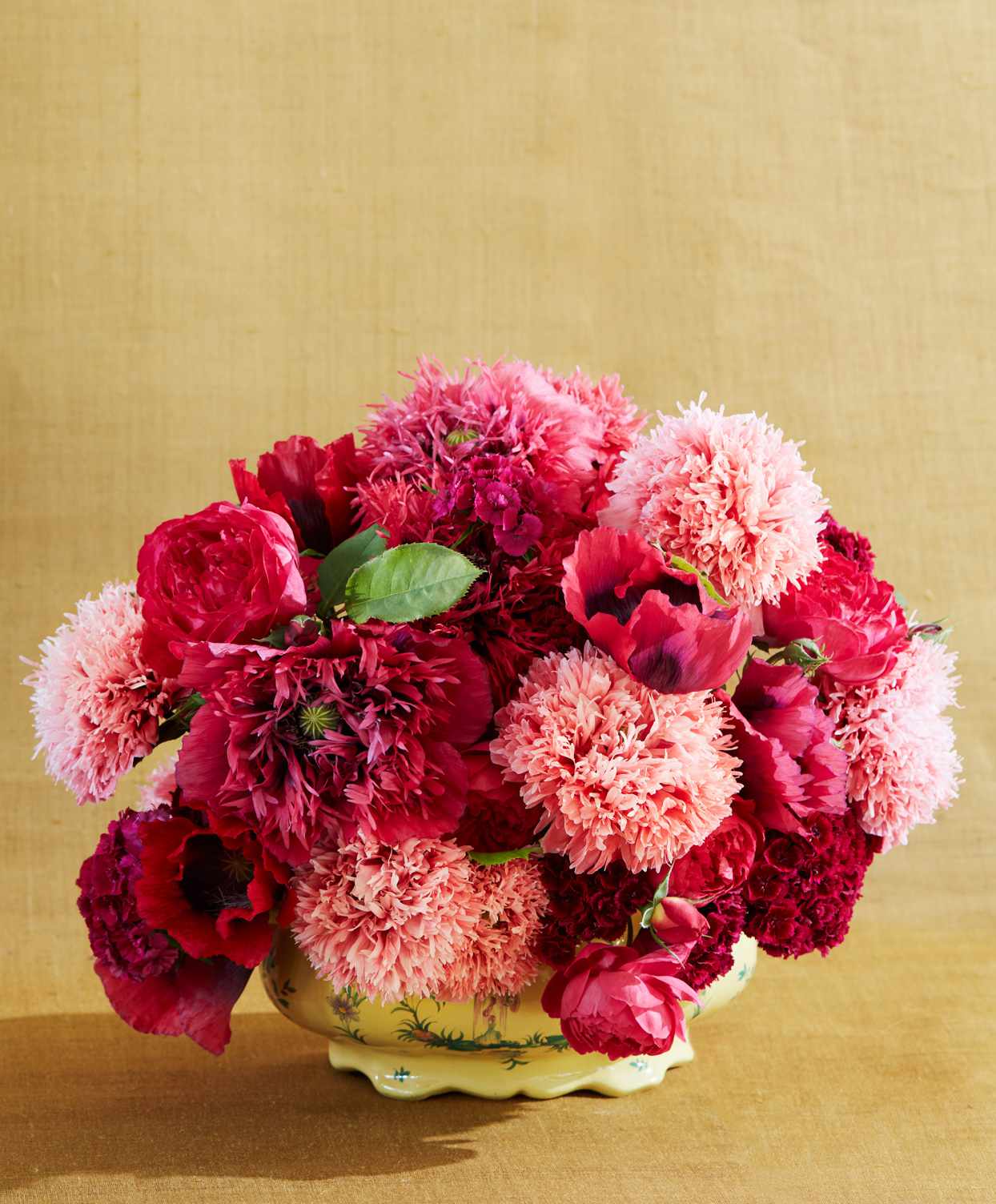 pink rose and poppy arrangement