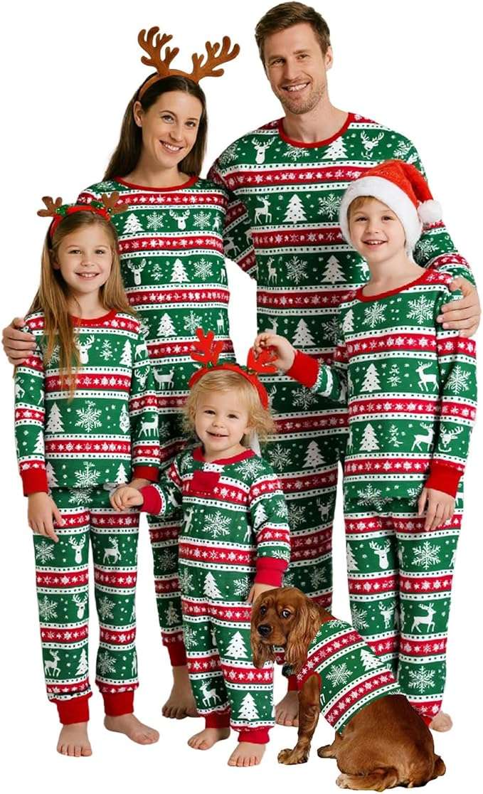 A family and a dog wearing matching festive pajamas with holiday patterns some wearing seasonal accessories