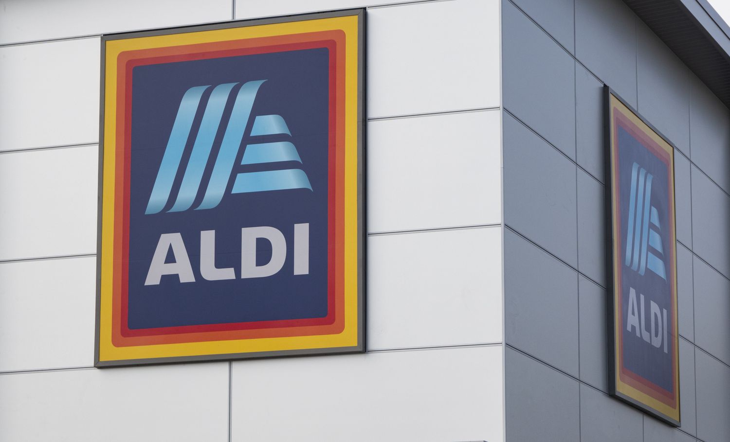 Aldi store sign on the side of a building