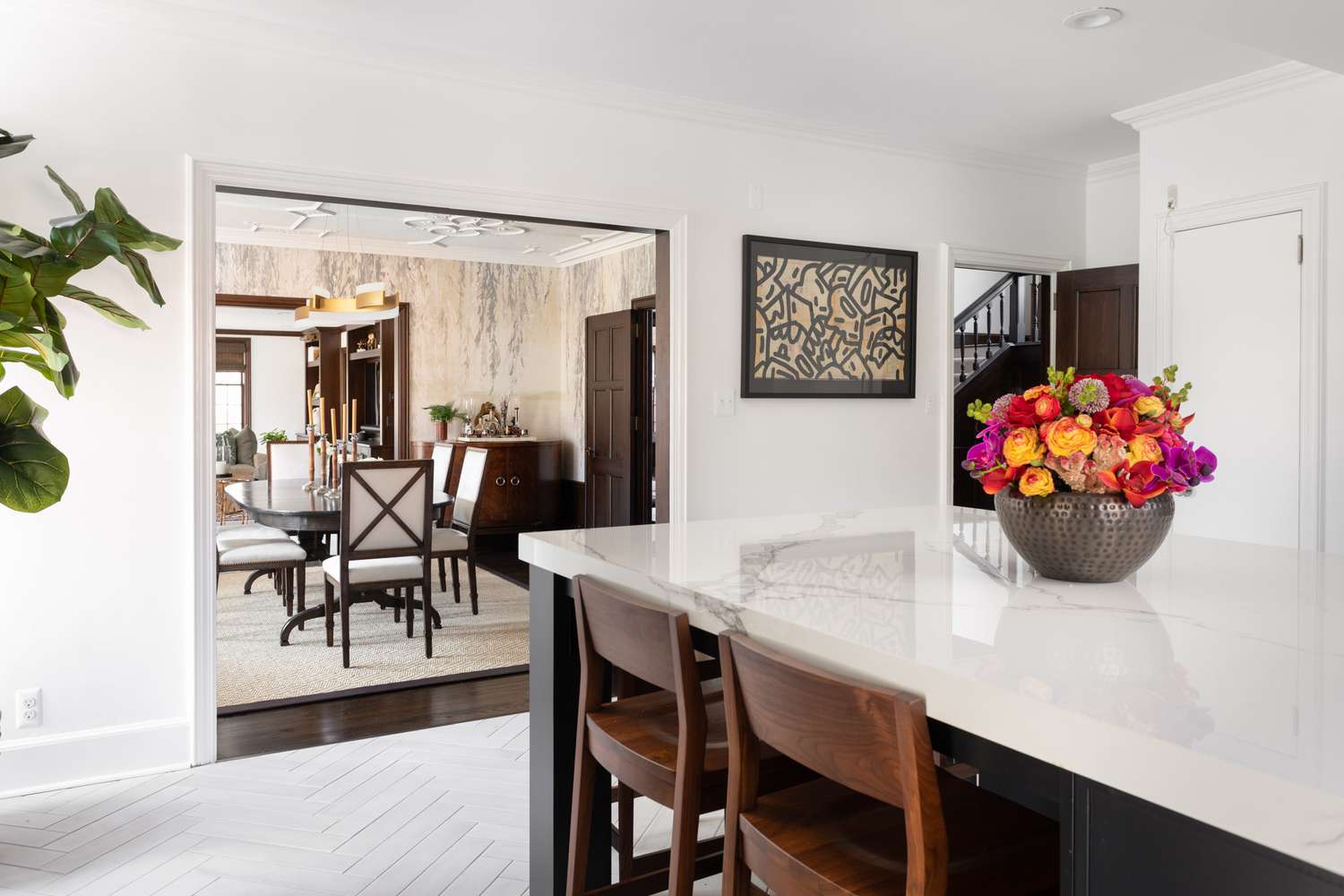 Kitchen with white island and slate floors