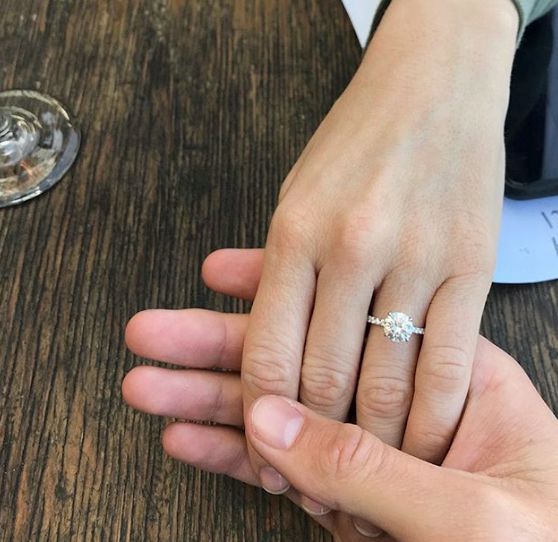 brittany snow and tyler stanaland engagement ring hands