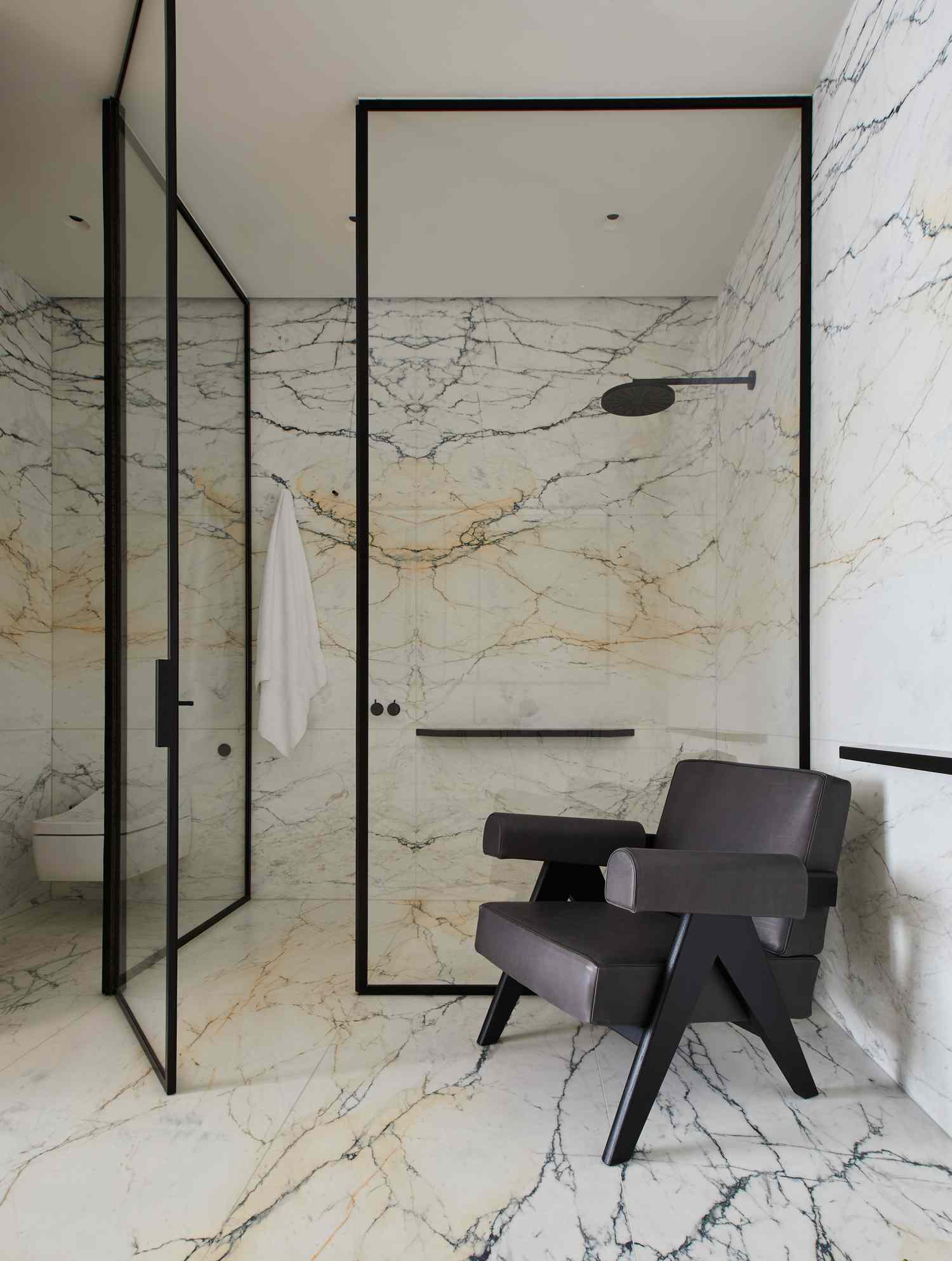 white marble walk-in shower