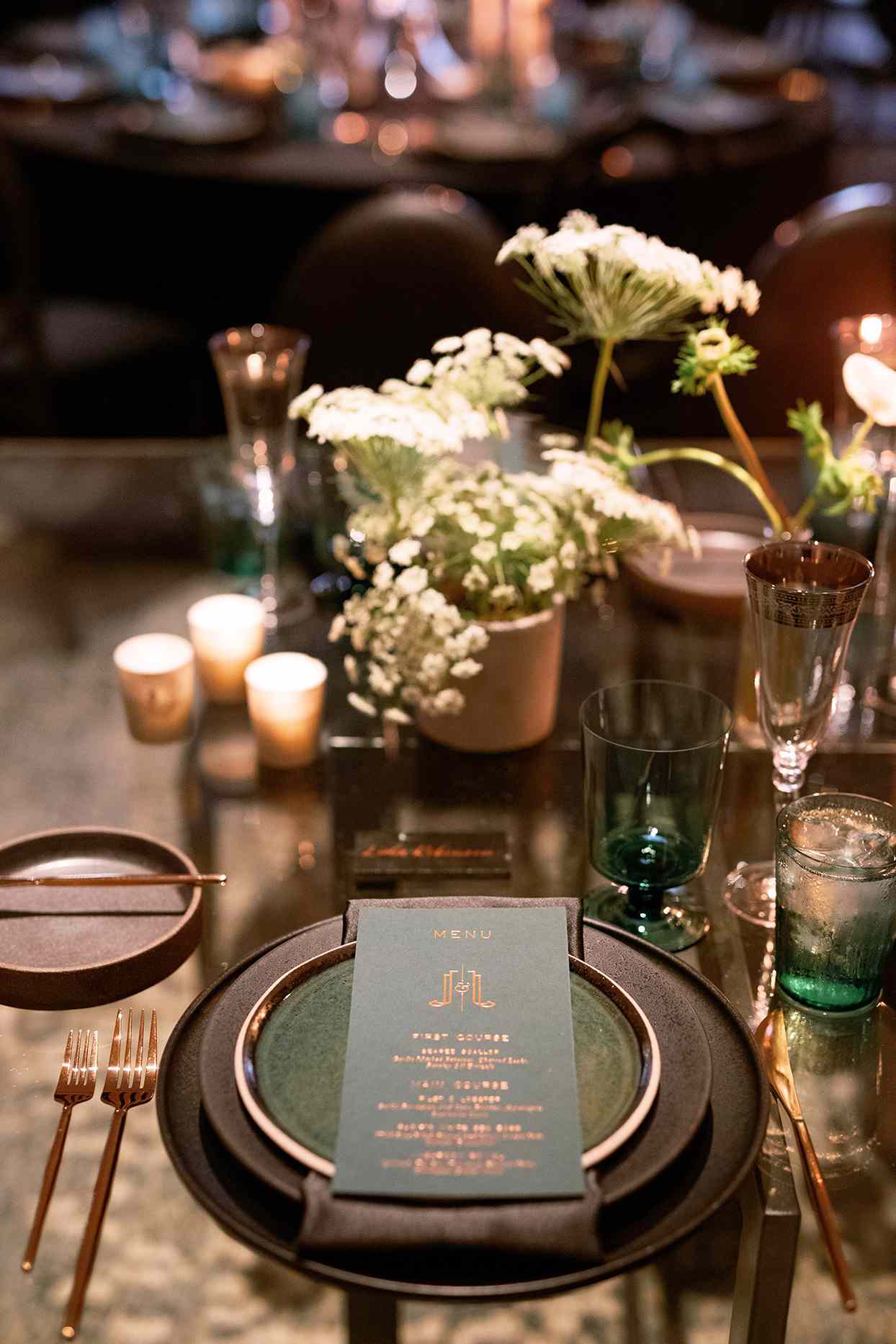 jason justin wedding reception dark tones place setting