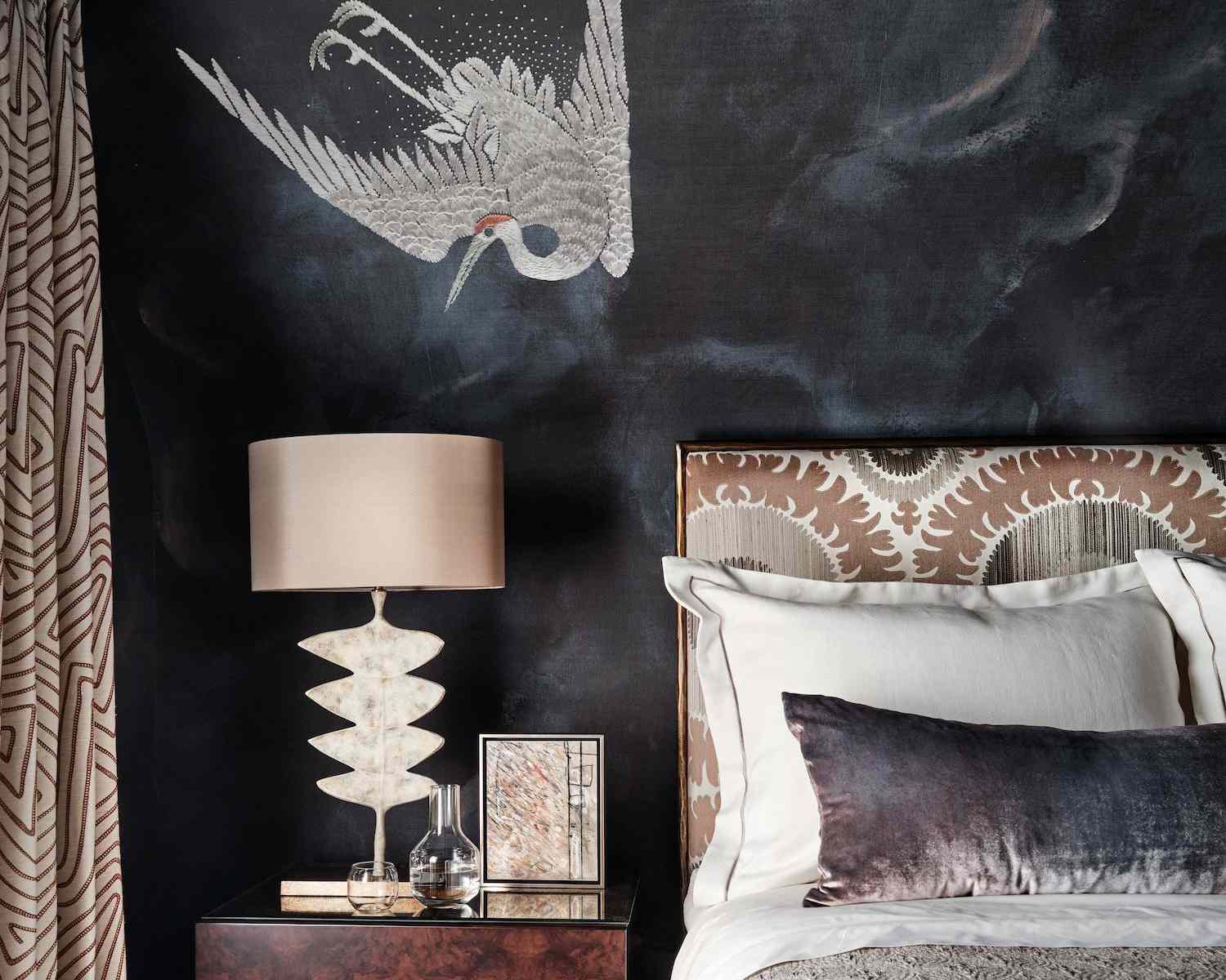 black bedroom wall with mural