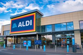 The frontage and brand logo of a branch of German discount retailer Aldi. 