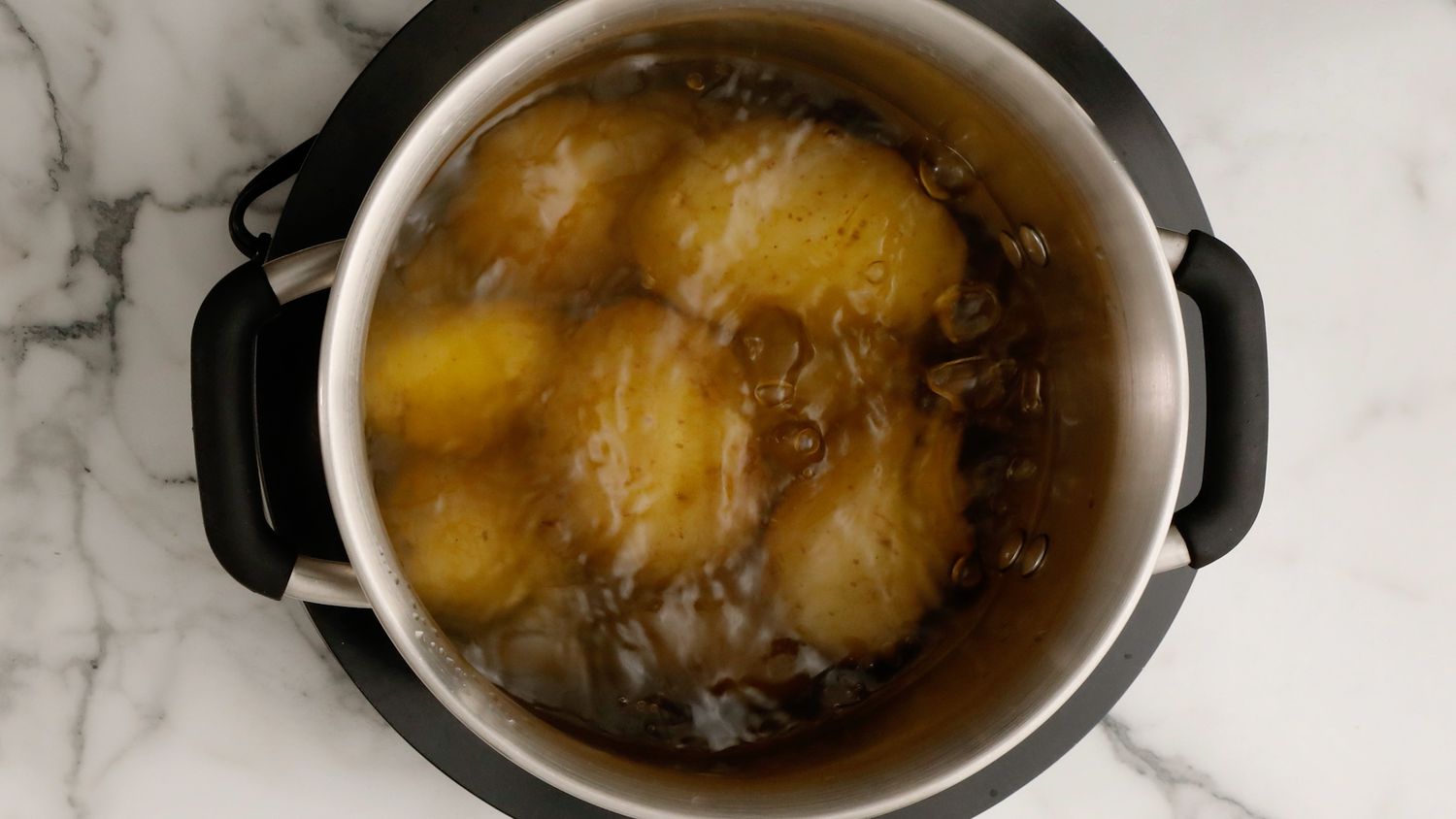 Cooking potatoes for Big Martha's mashed potatoes