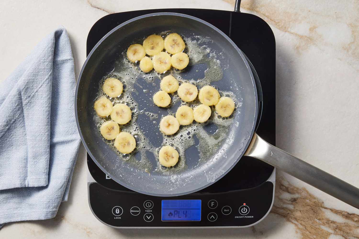 Banana slices in skillet