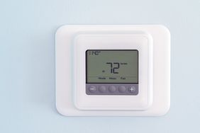 A digital thermostat displaying a temperature of 72 degrees