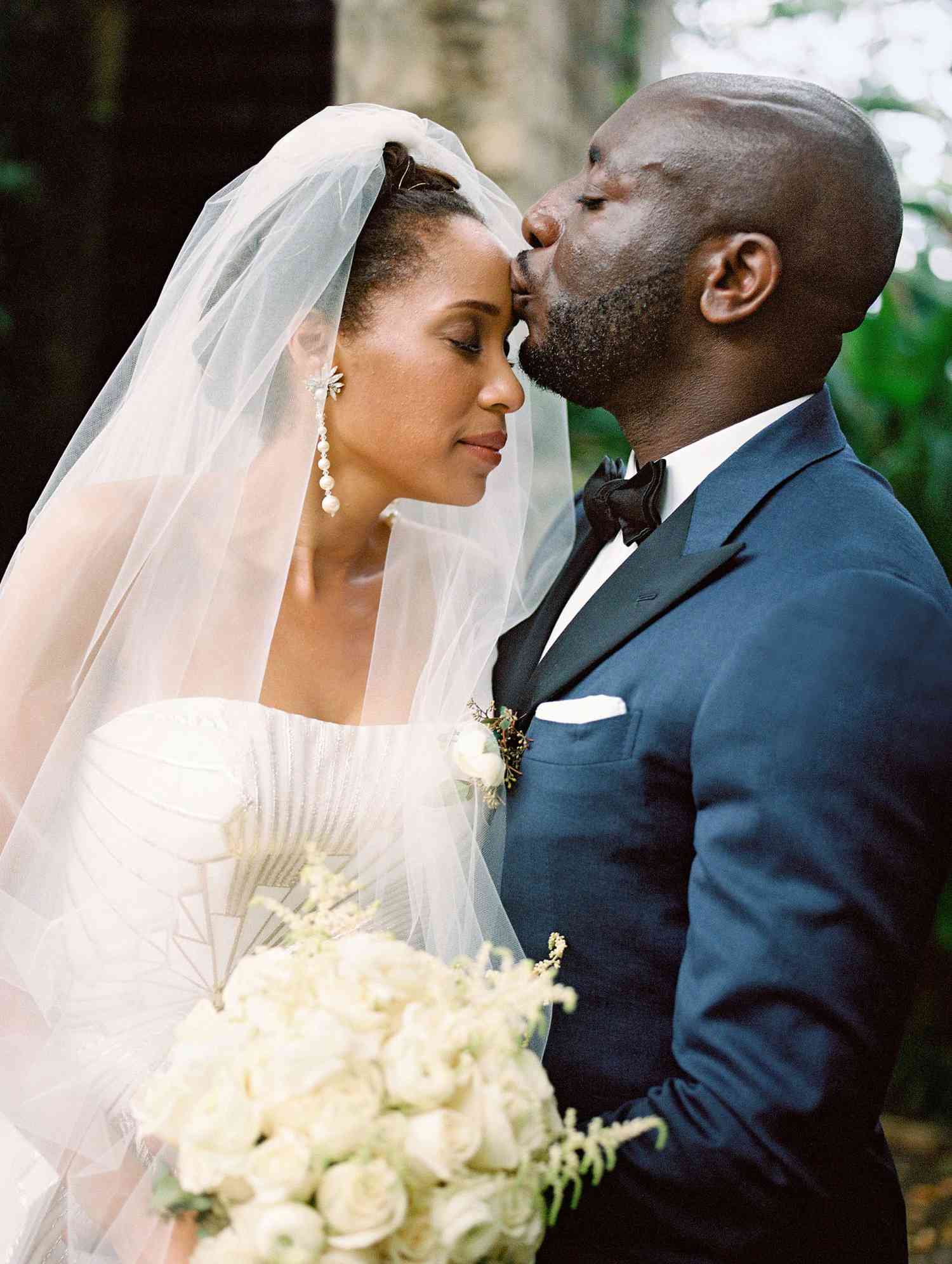 porsha terry wedding jamaica forehead kiss bride groom
