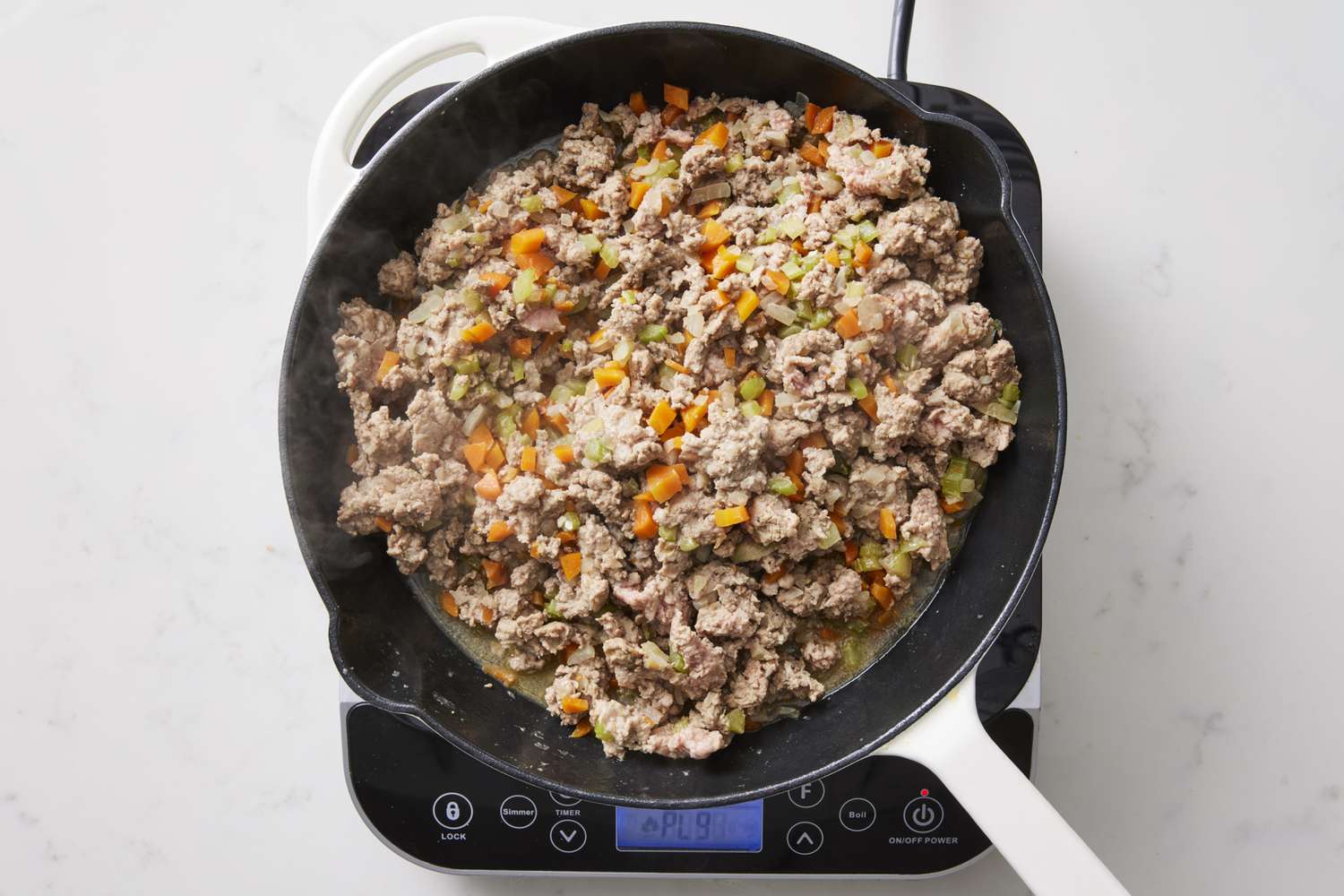 Turkey and vegetables in skillet