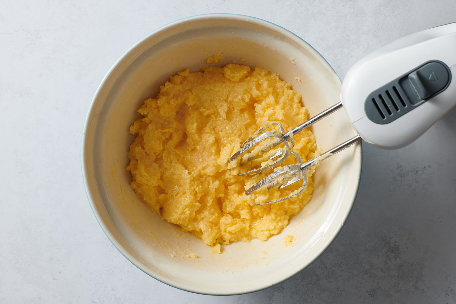 eggs added and mixed in with butter and sugar