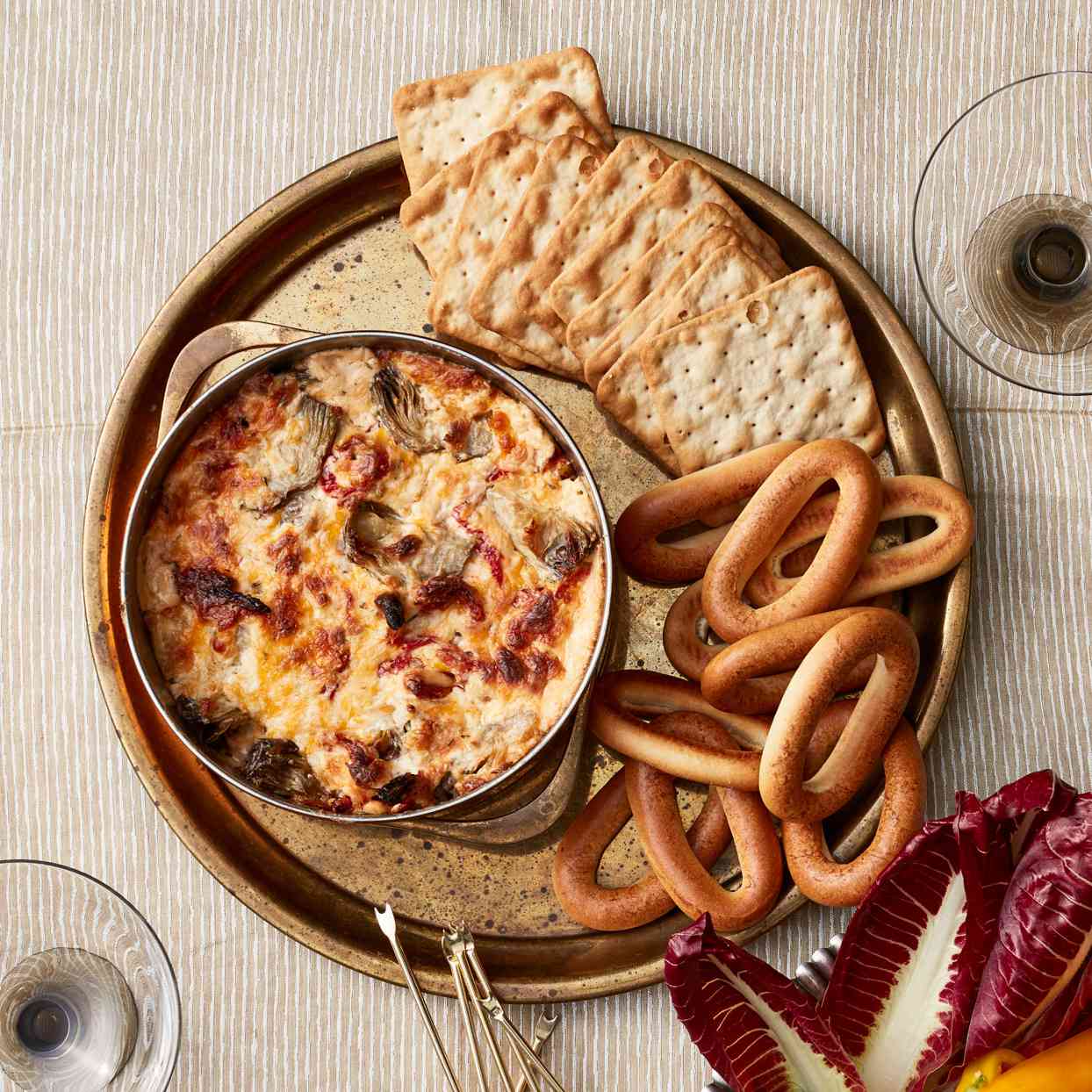 cheese dip with pretzels and crackers