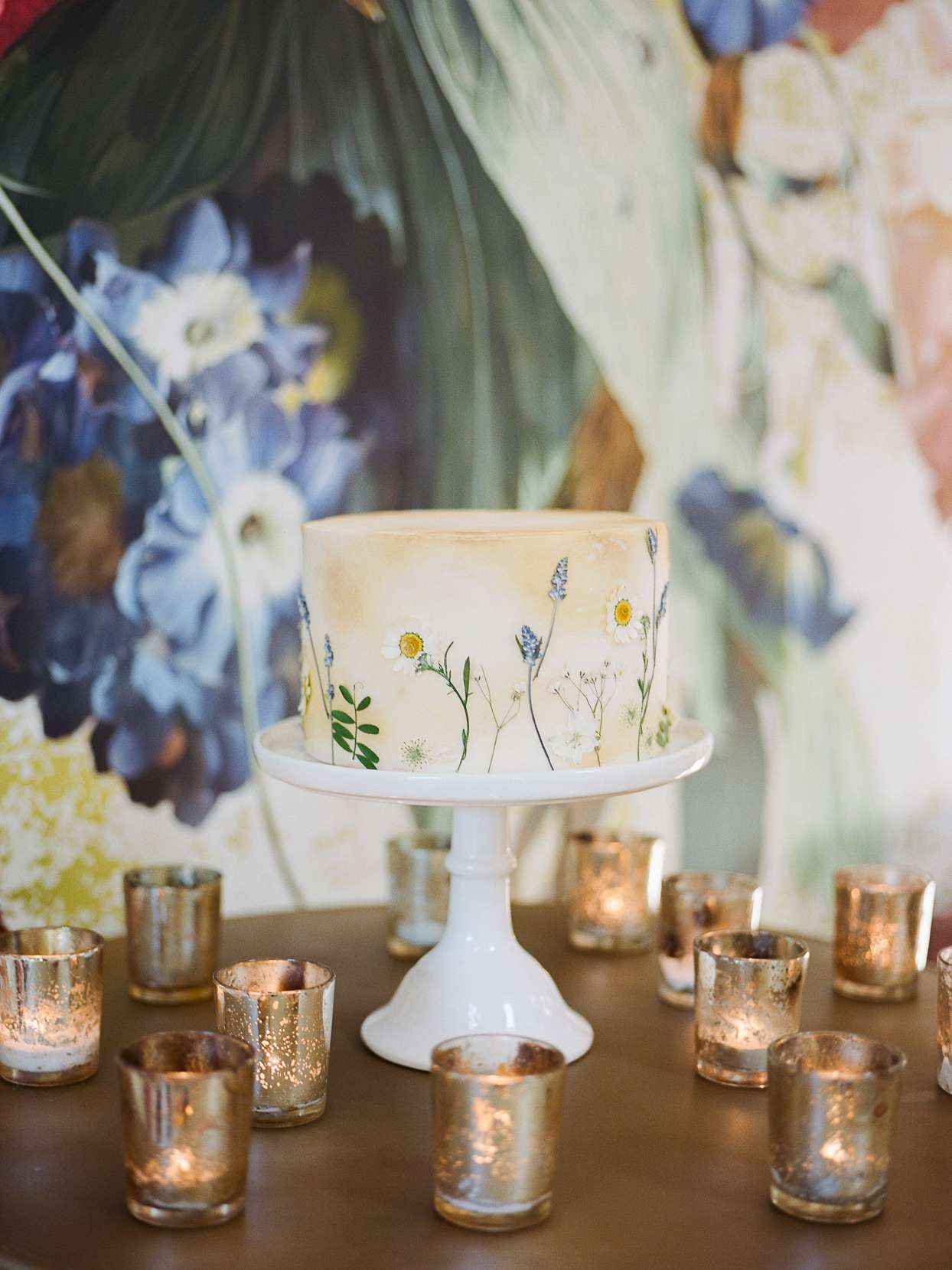 single tiered floral accented design wedding cake