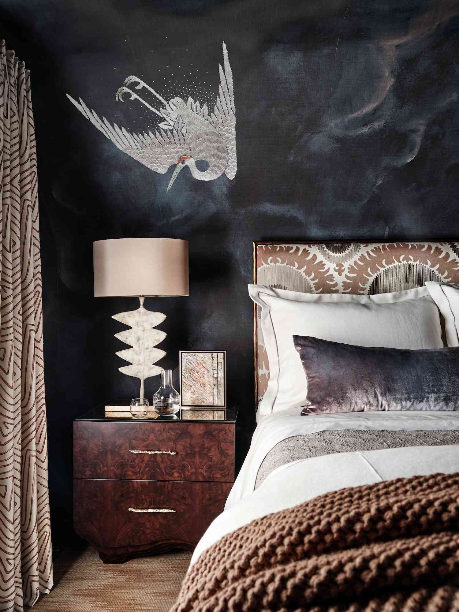black bedroom with neutral tones