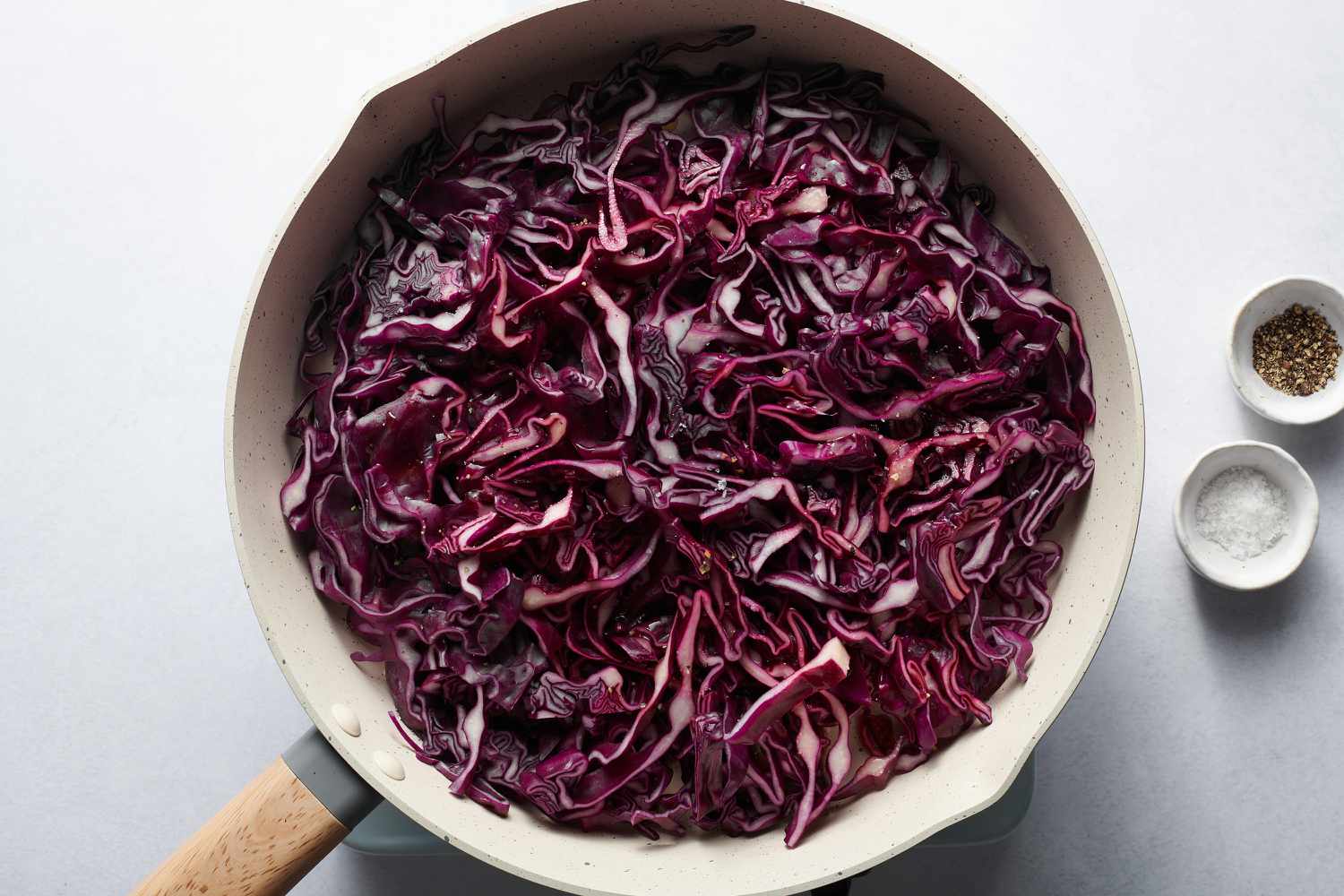 sliced red cabbage in pan