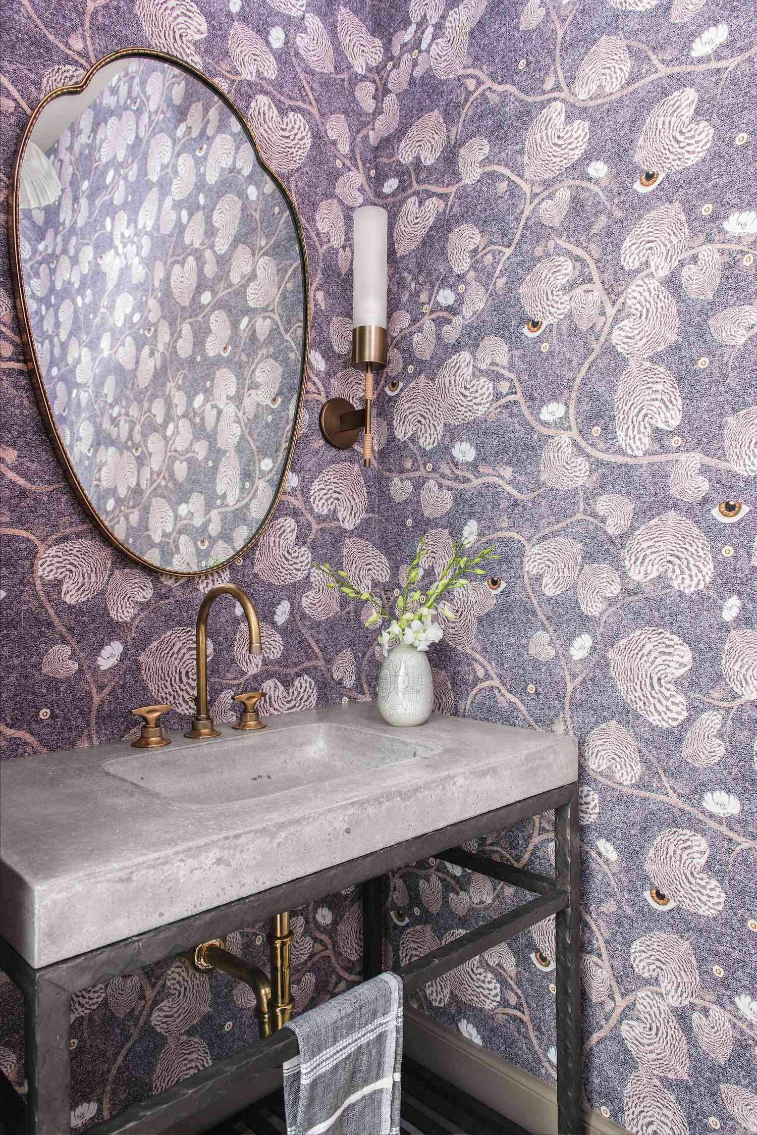 purple and brass jewel box bathroom