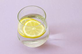 glass of water with lemon slices