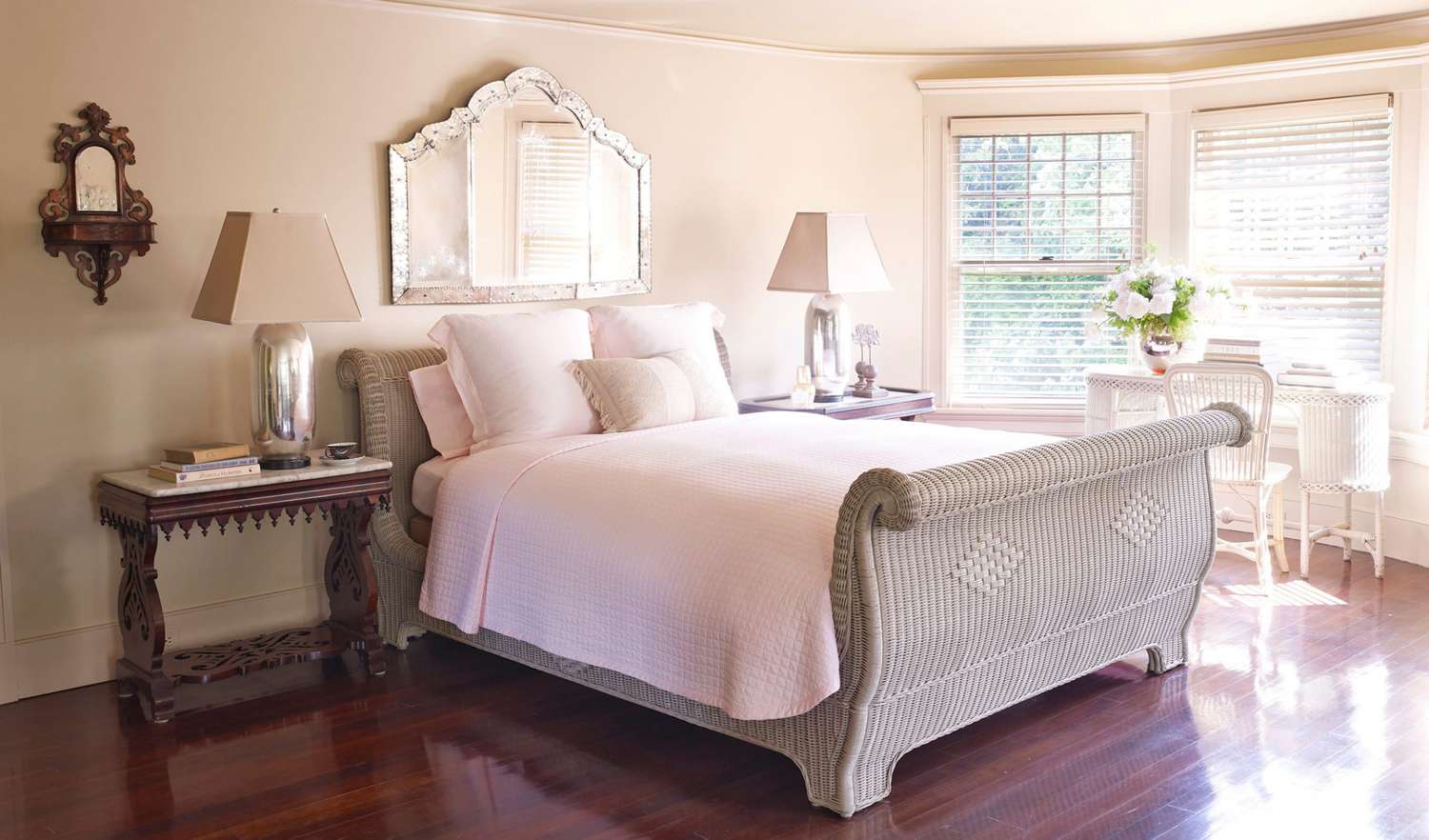 bedroom with wicker bed and writing desk
