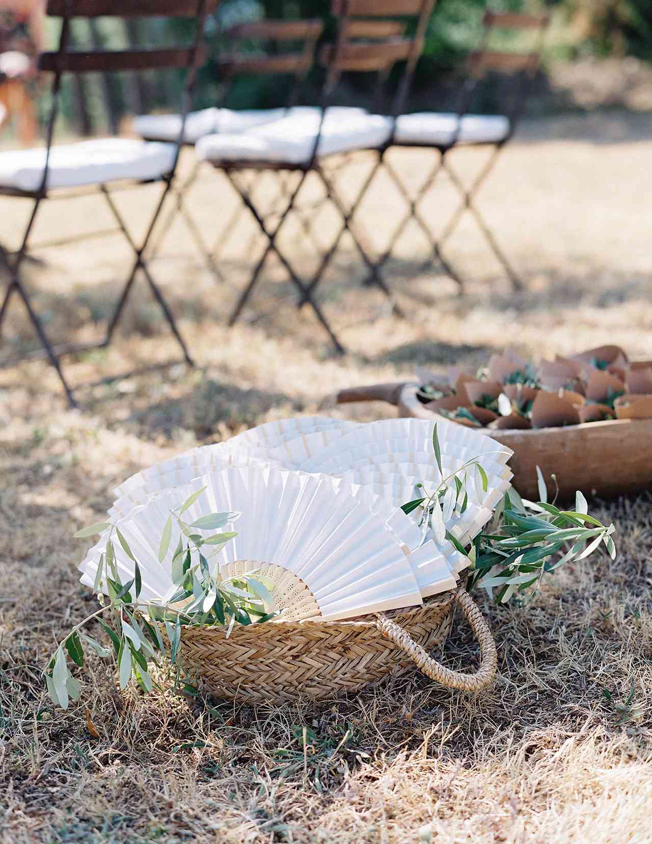 wedding guest fans wicker baskets