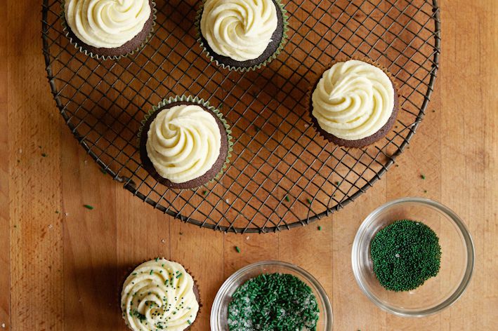 irish stout cupcakes being sprinkled