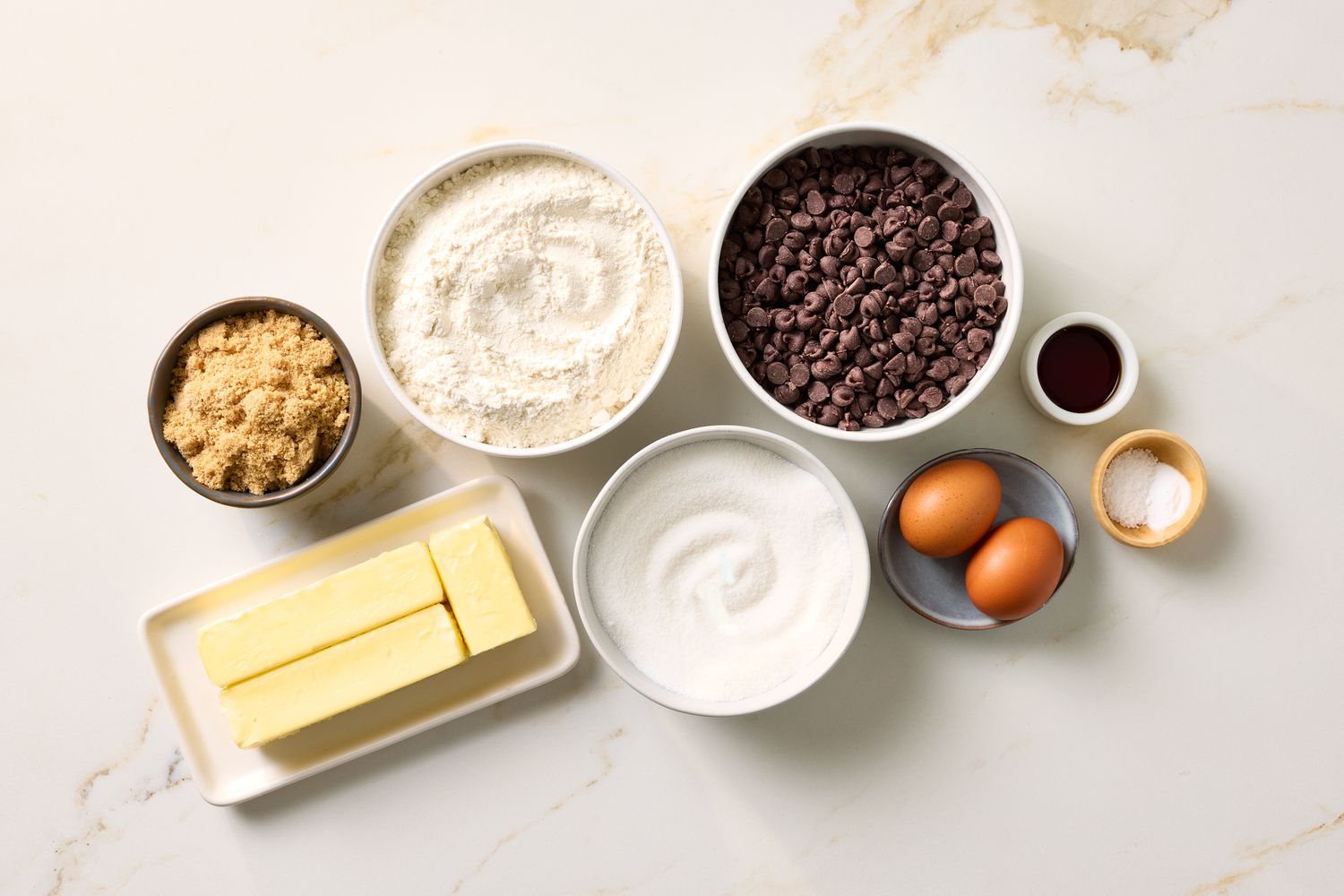 Ingredients for baking cookies arranged on a countertop