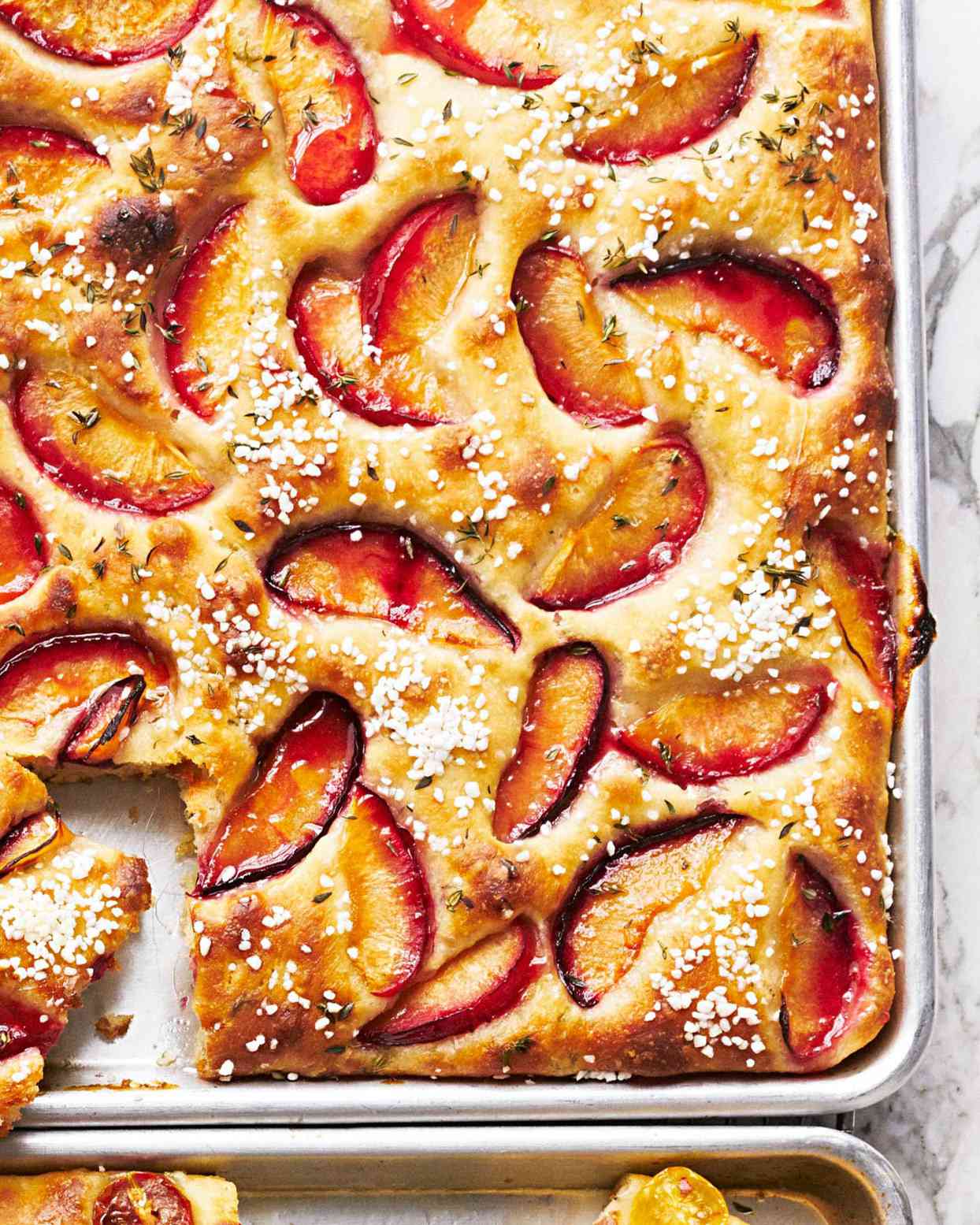 plum focaccia in baking sheet