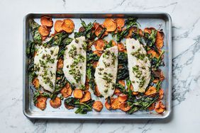 fish and vegetables on baking sheet