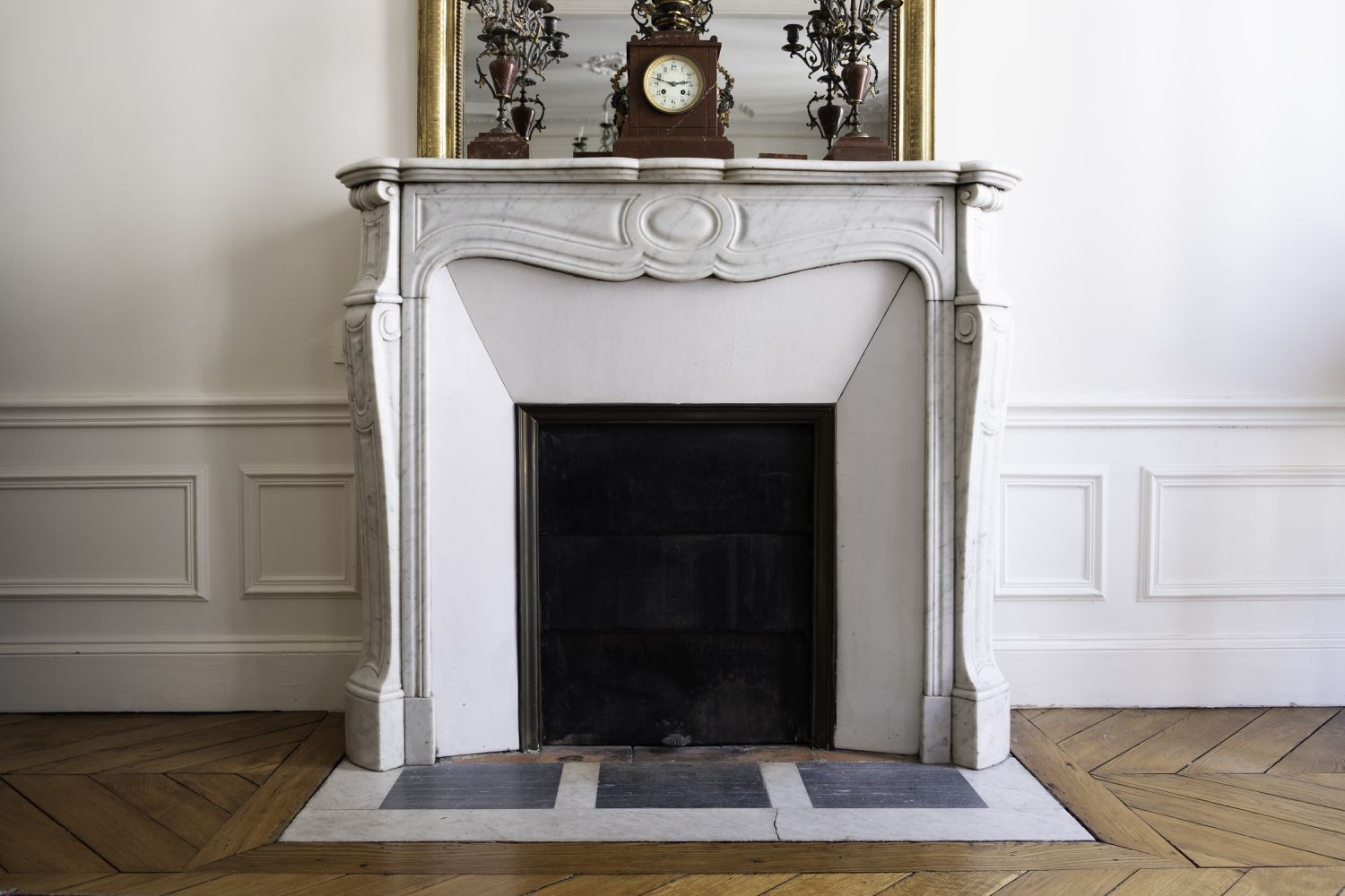 marble fireplace in a Parisian apartment