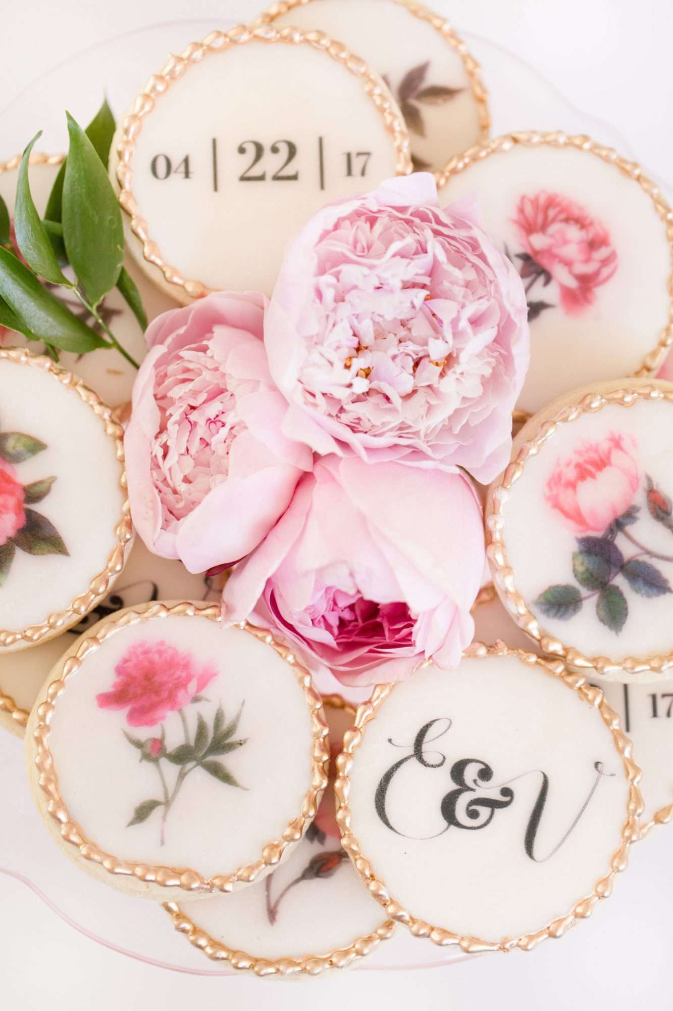 round gold frosted trim wedding cookies