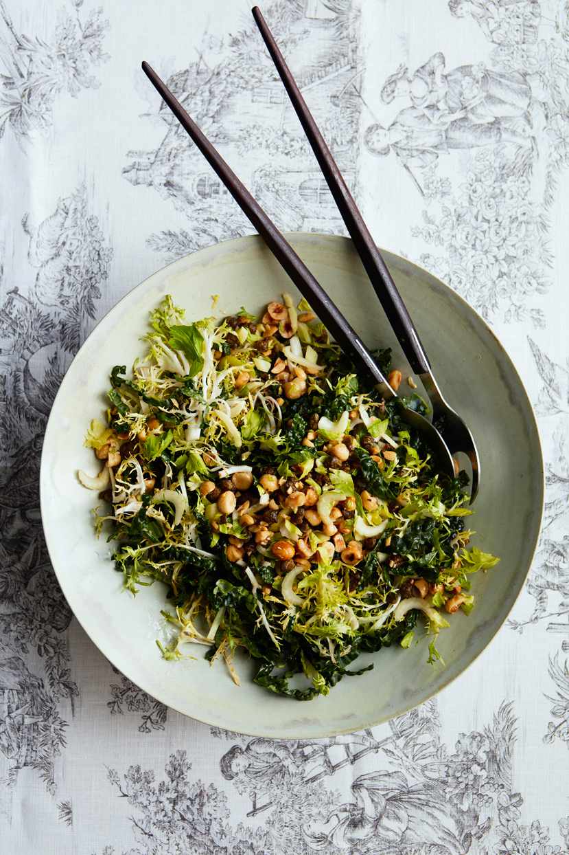 kale-and-frisee salad with sherry vinaigrette atop toile pattern tablecloth