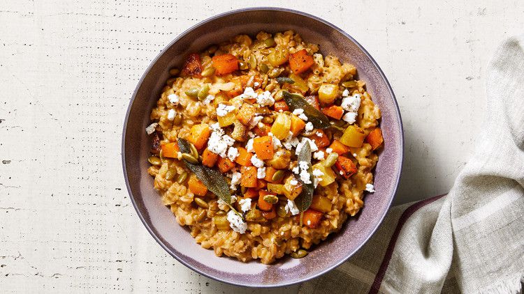 baked farro risotto with golden vegetables and goat cheese