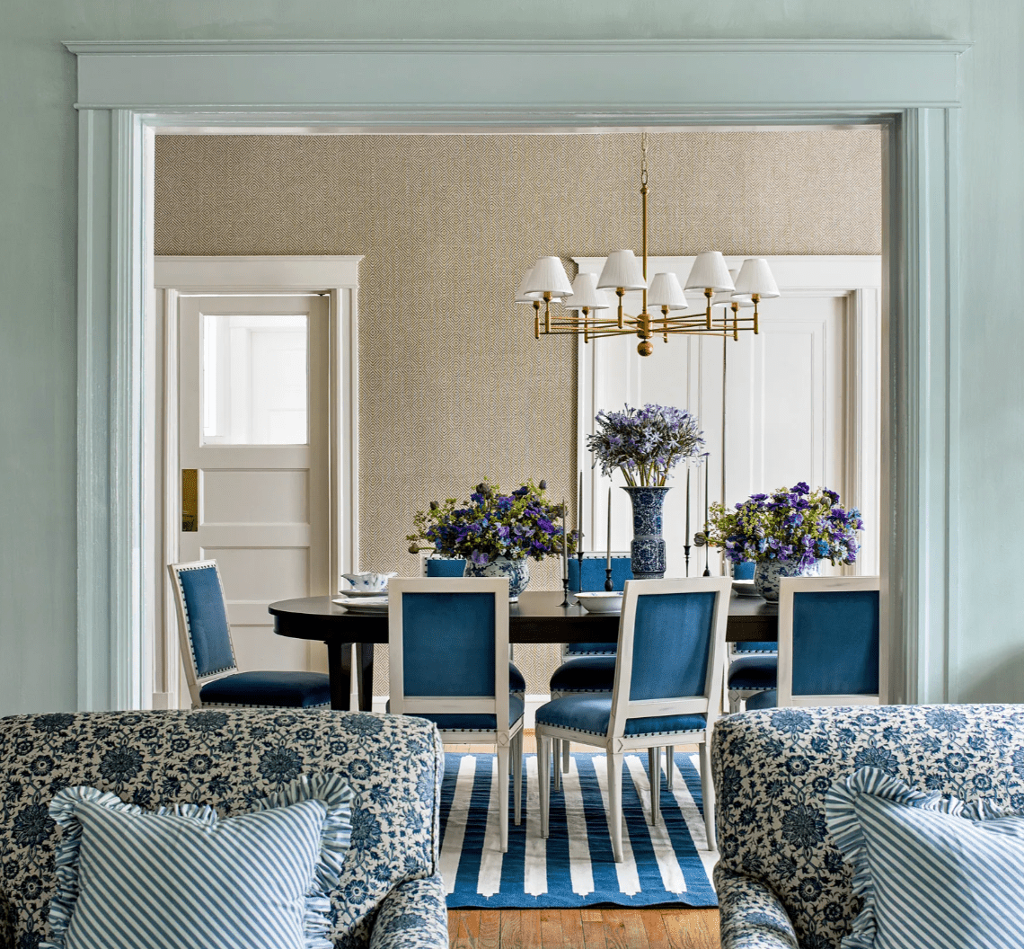 Dining room and living room with blue decor