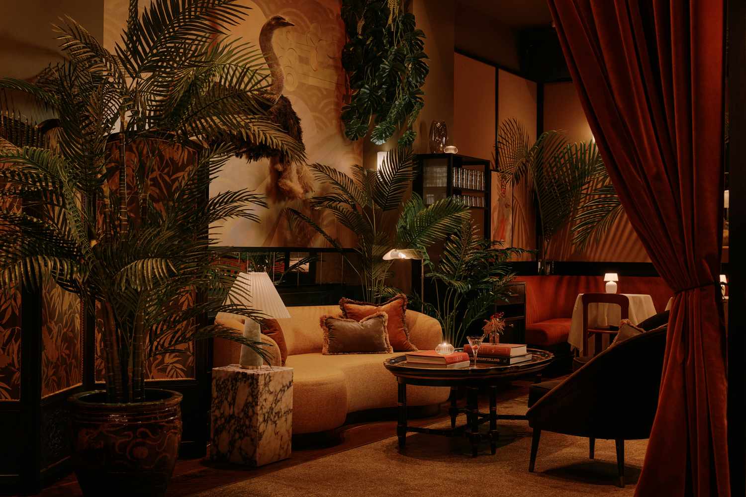 Hotel-style lounge area with velvet red drapes