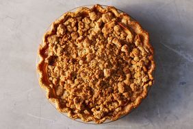 apple crumble pie on gray countertop