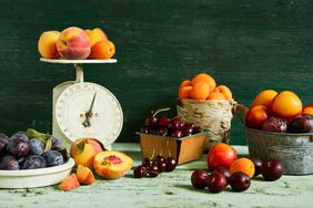 Stone fruit in bowls and baskets 