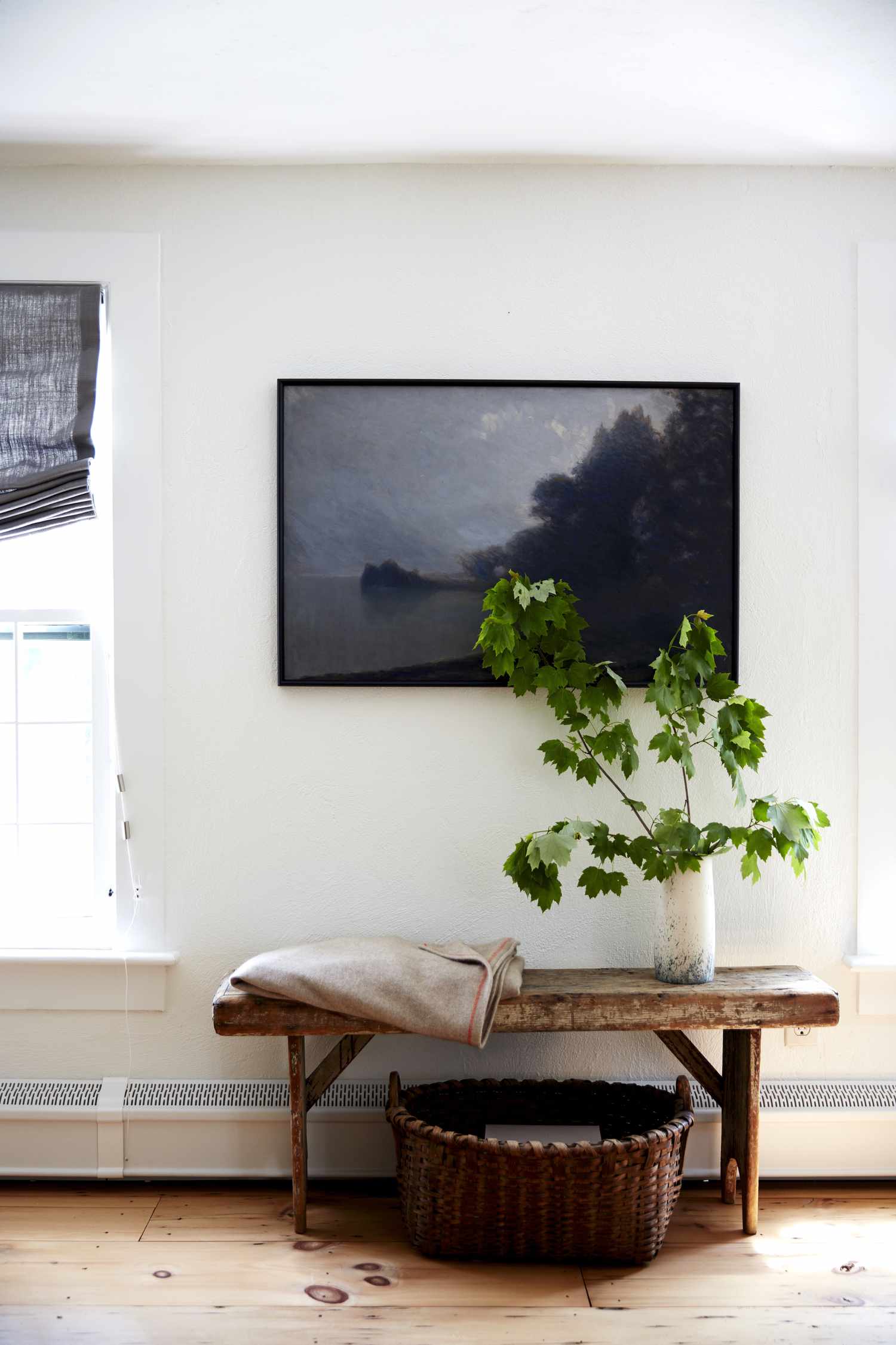 Large painting over a bench