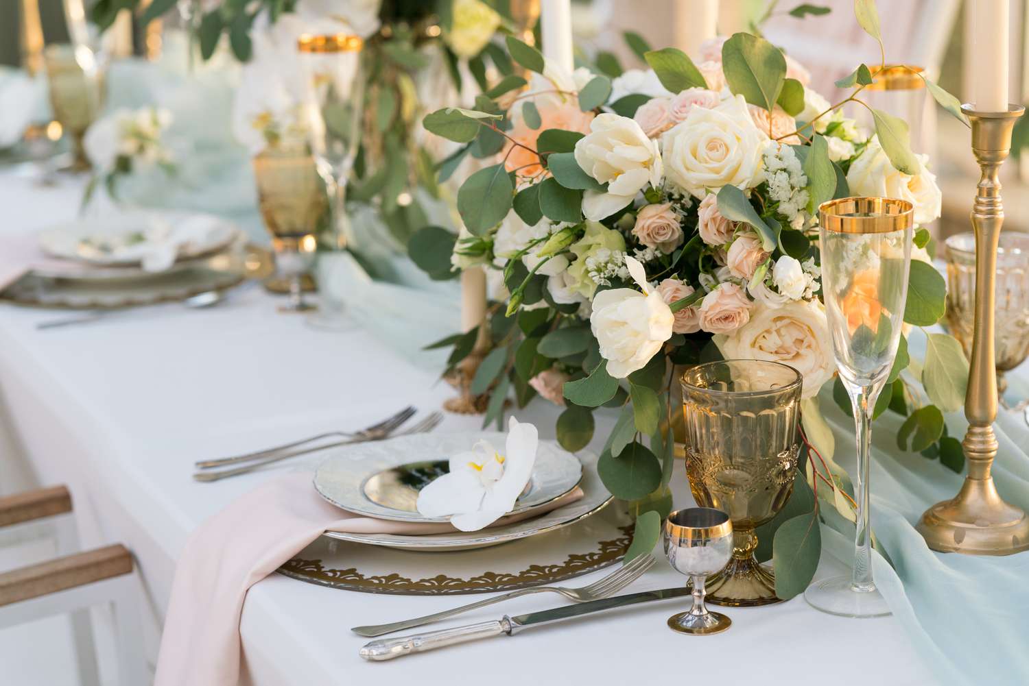 beautifully decorated table with flowers for wedding party