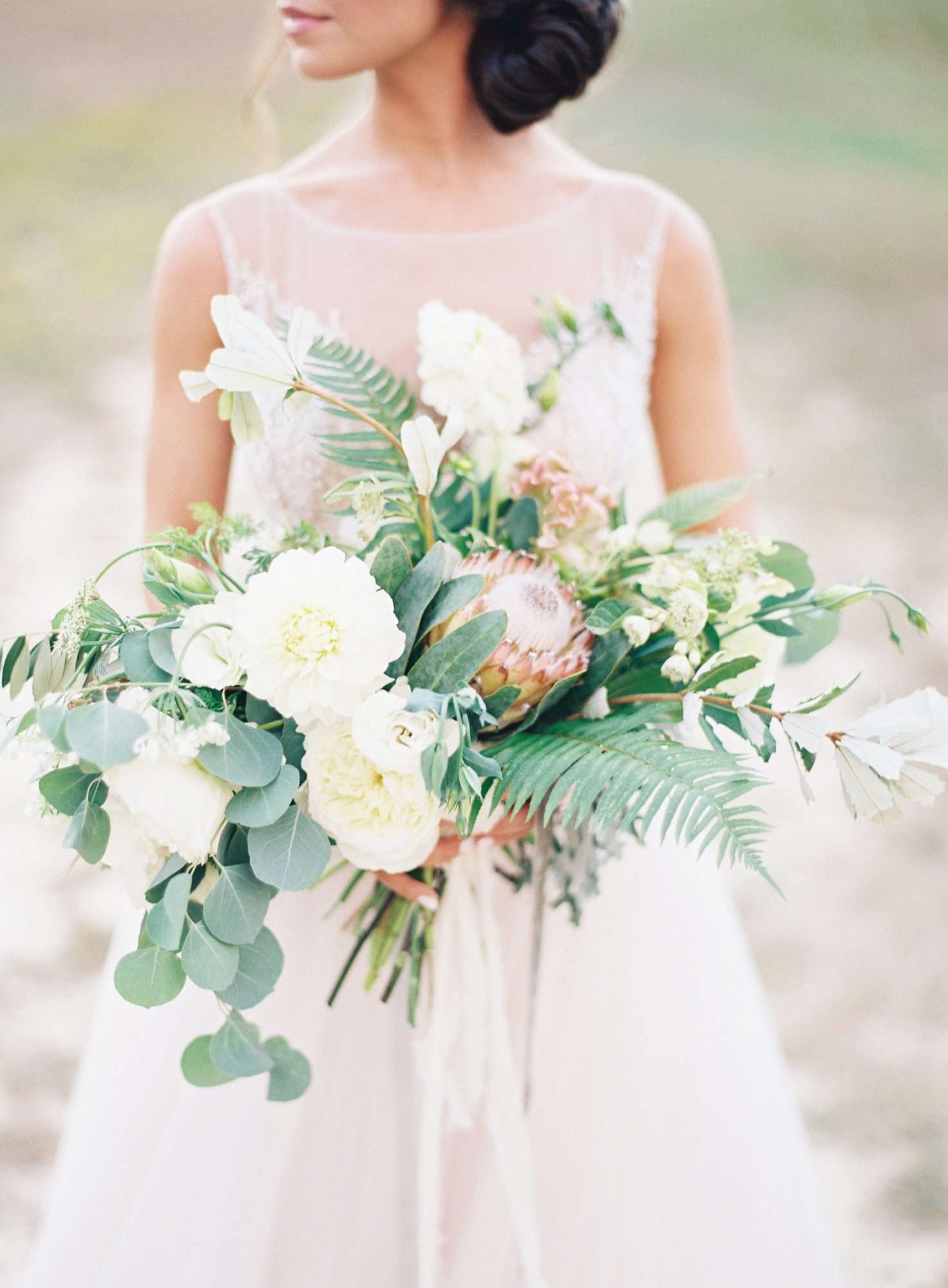 Bride Holding Ivory Wedding Bouquet