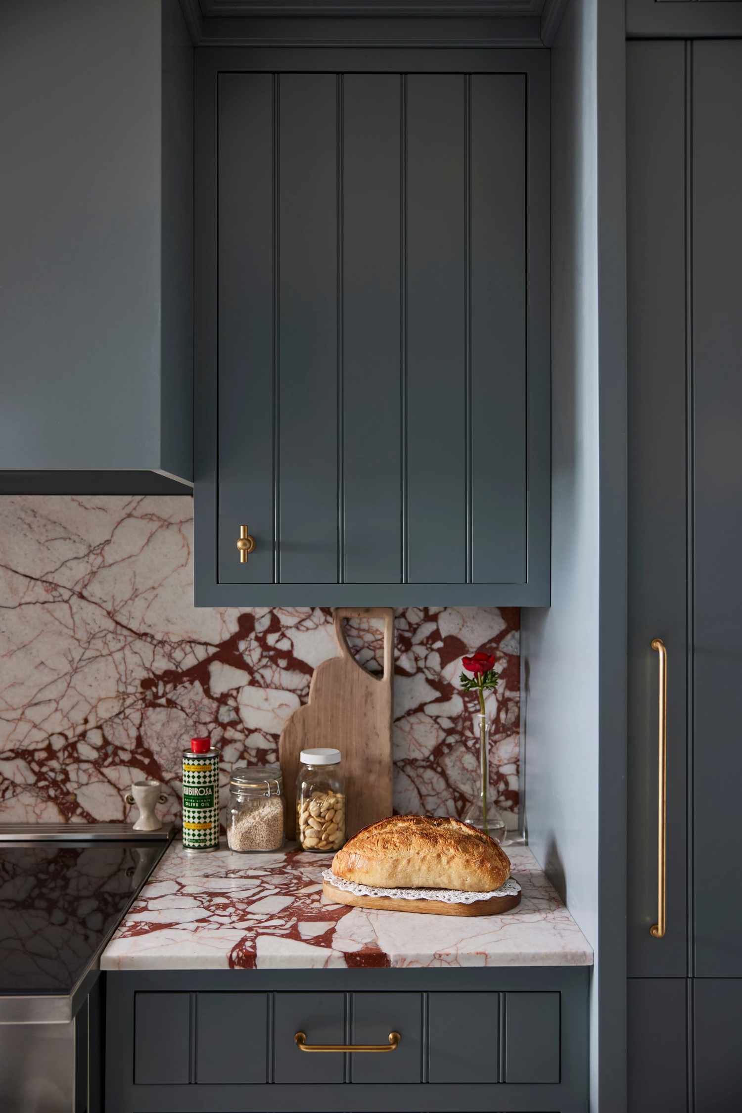 blue cabinet with brass hardware