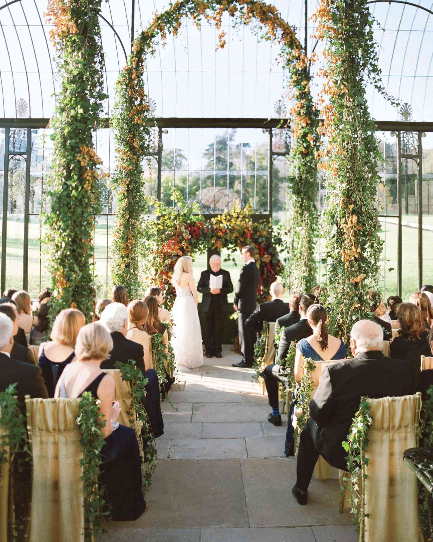 Unkempt Willow Branch Wedding Arch with Pink and Orange Flowers