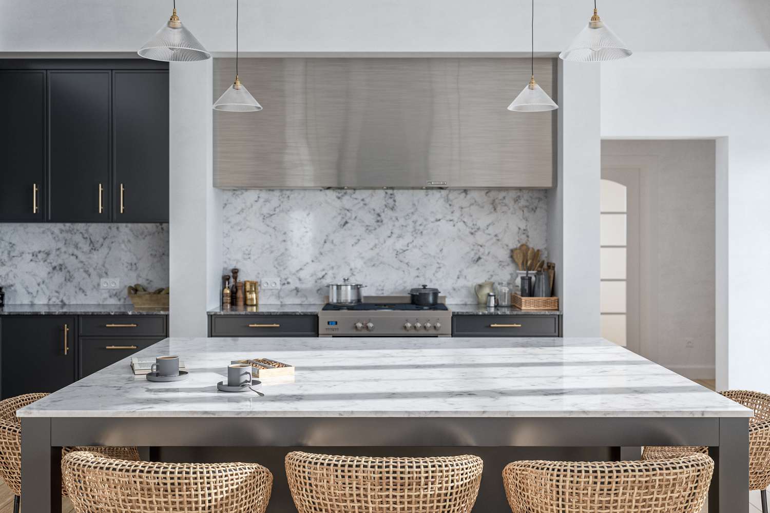 Modern gray and stainless steel kitchen with rectangular white and gray marble breakfast kitchen island with five rattan stools and four pendant white glass lights over it.